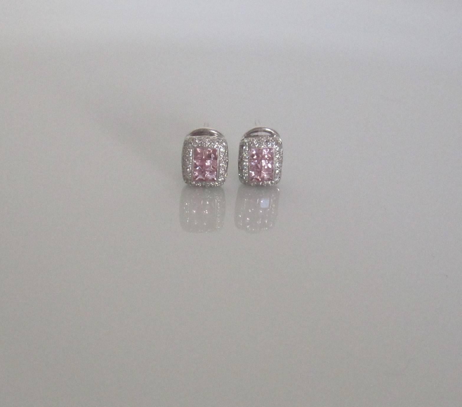 A beautiful and sparkling pair of earrings comprised of 18-karat white gold, genuine diamonds, and square pink sapphires. Each earring, diamonds are set 'pave' around 6 square cut pink sapphires, all in an 18-karat white gold rectangular setting.