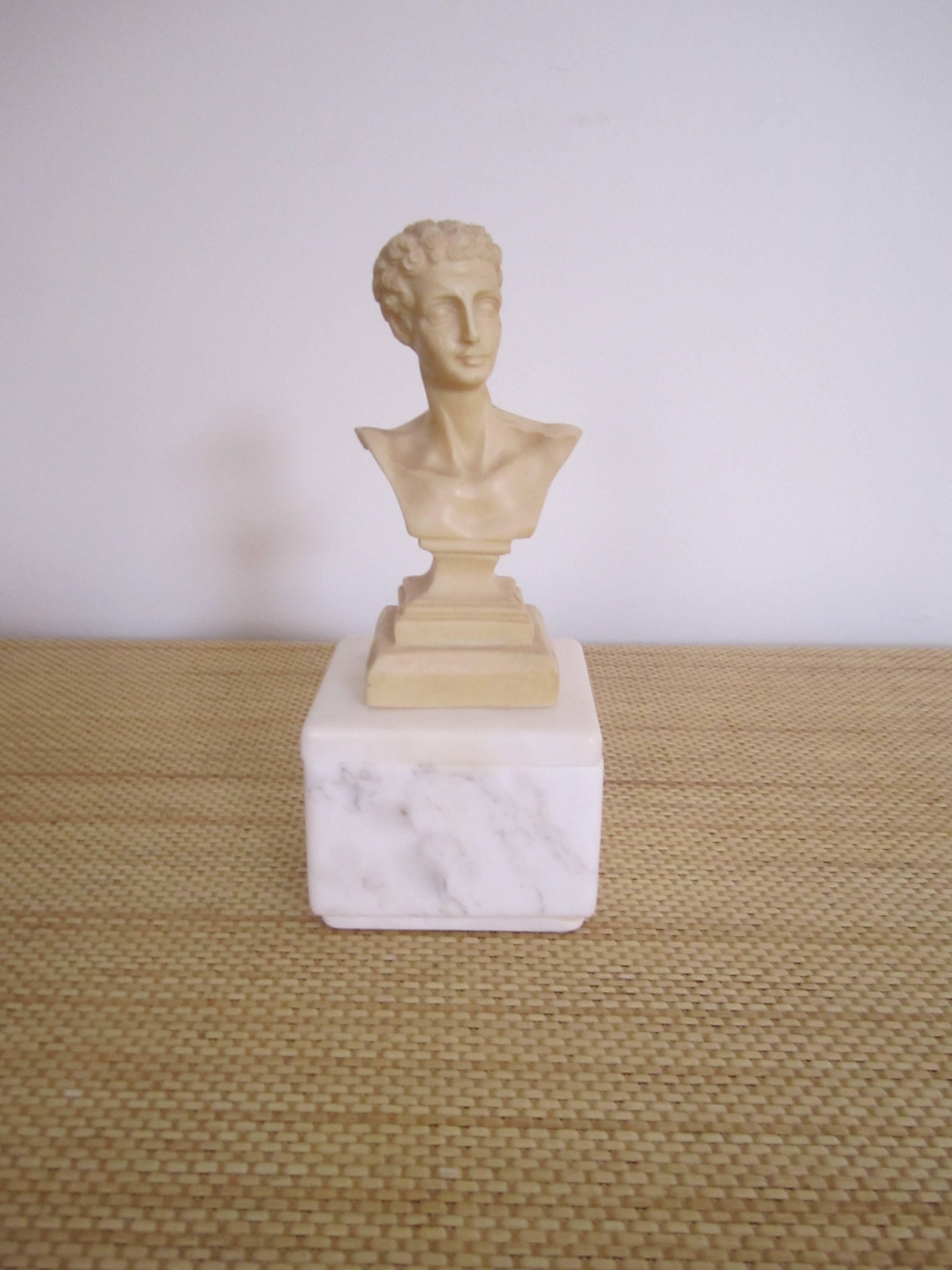 A Mid-Century classical Roman style male sculpture bust. Marked 'Made in Italy' on bottom as show in image #10.

Sculpture measures: 6