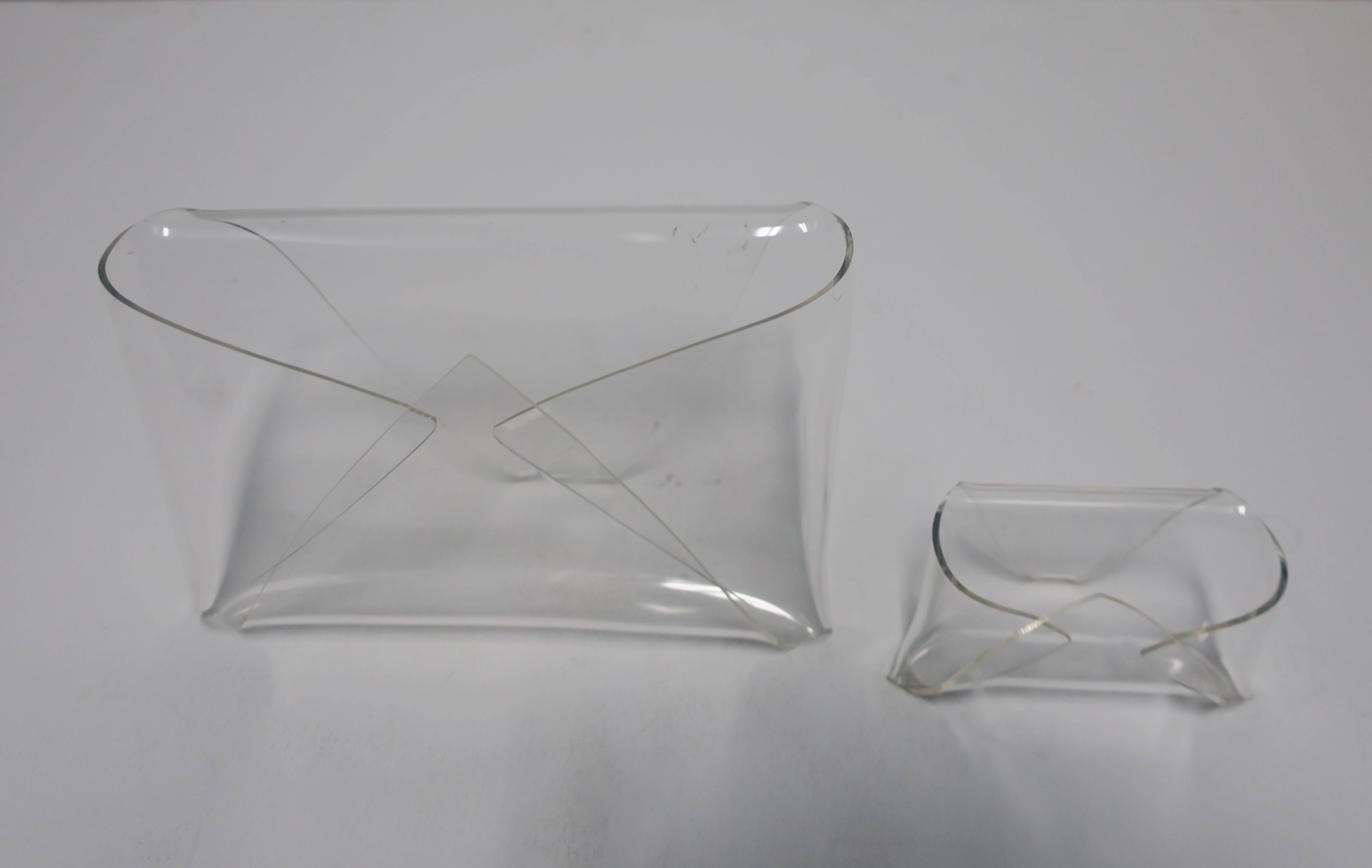 A vintage Lucite or acrylic mail and business card desk set. Clear acrylic is strategically bent into an 'envelope' form. Convenient for a desk for display area. Measurements include: 8