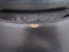 Sac Constance Hermès noir et or, France