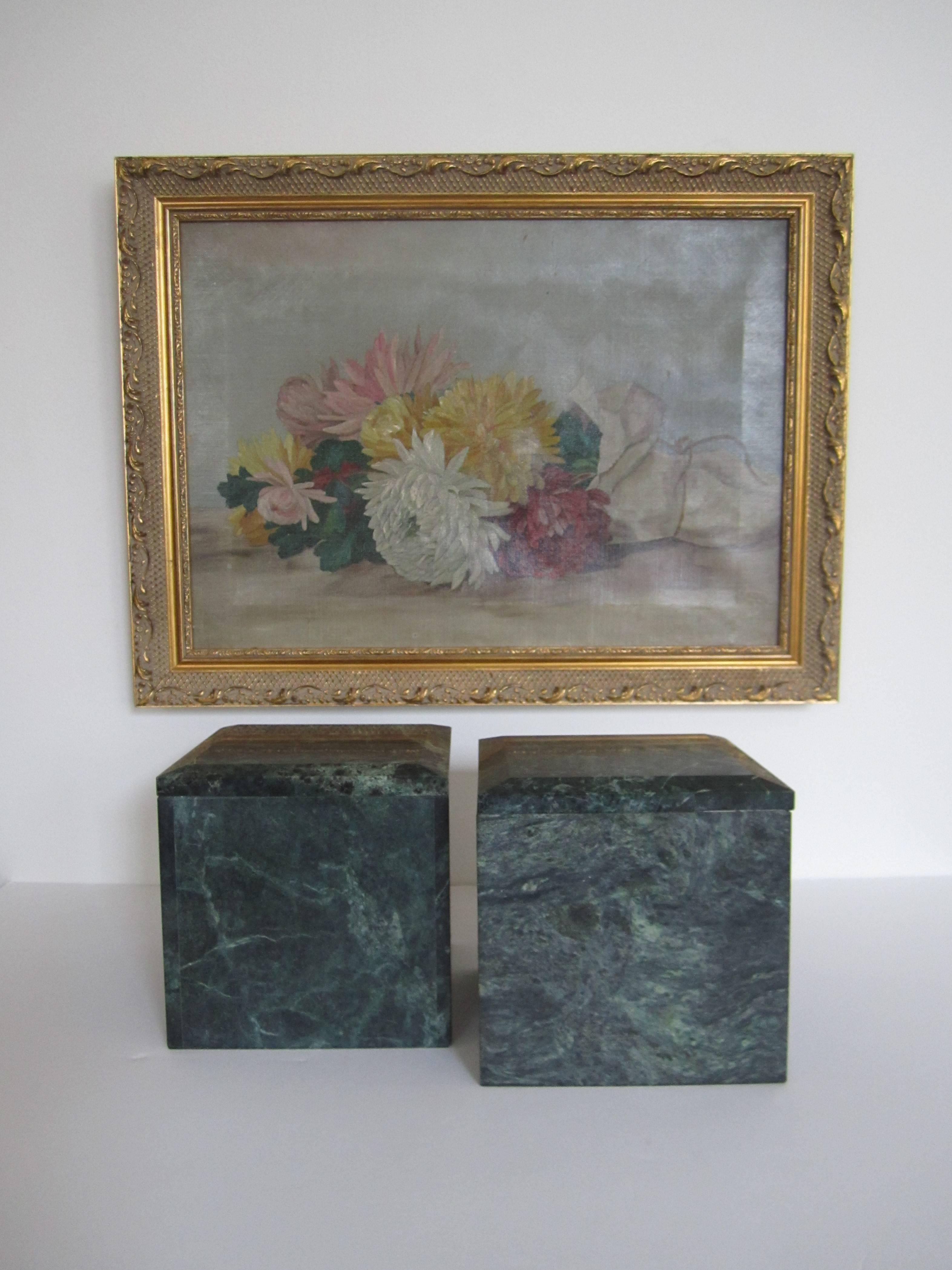 A vintage pair of substantial Modern square marble boxes in hunter green. Marble is predominantly dark green with white veining. Tops have a beveled edge. Measurements: 6 inches high x 6 x 6. Circa 1970s. Pair can also work as bookends. Set