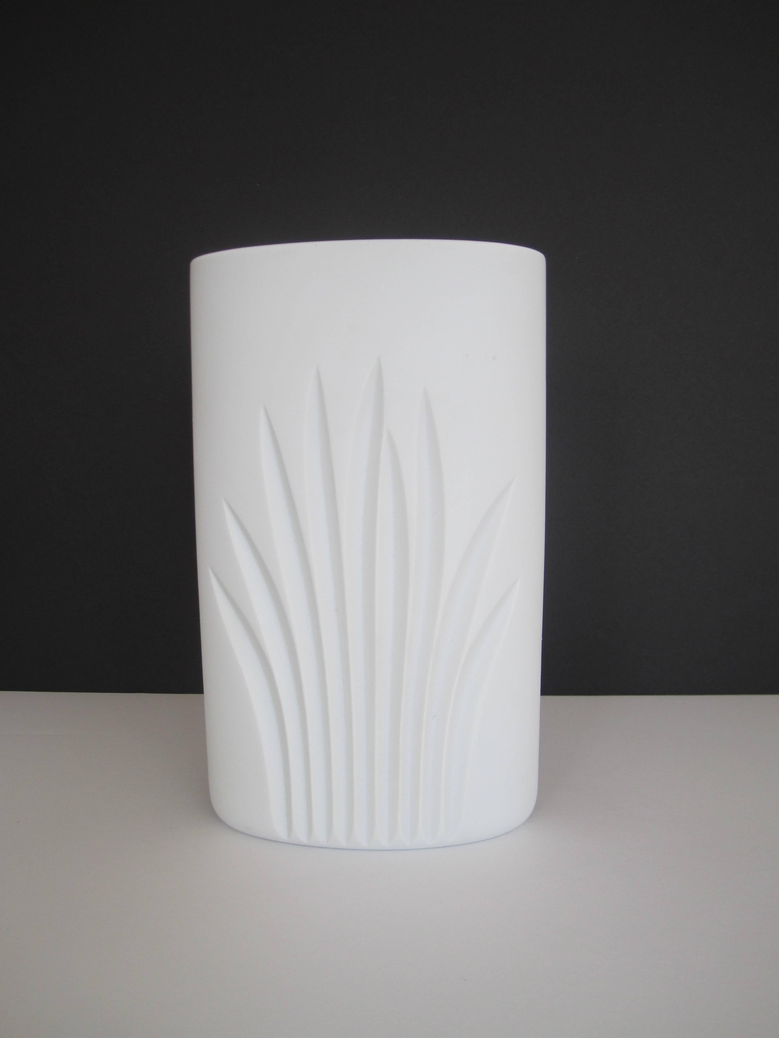 A white matte porcelain ceramic pottery vase by Rosenthal Studio-Line Collection, Germany. Oval in shape with identical organic modern design on both sides. Maker's mark and unique number on bottom as show in image #9. Beautiful with or without