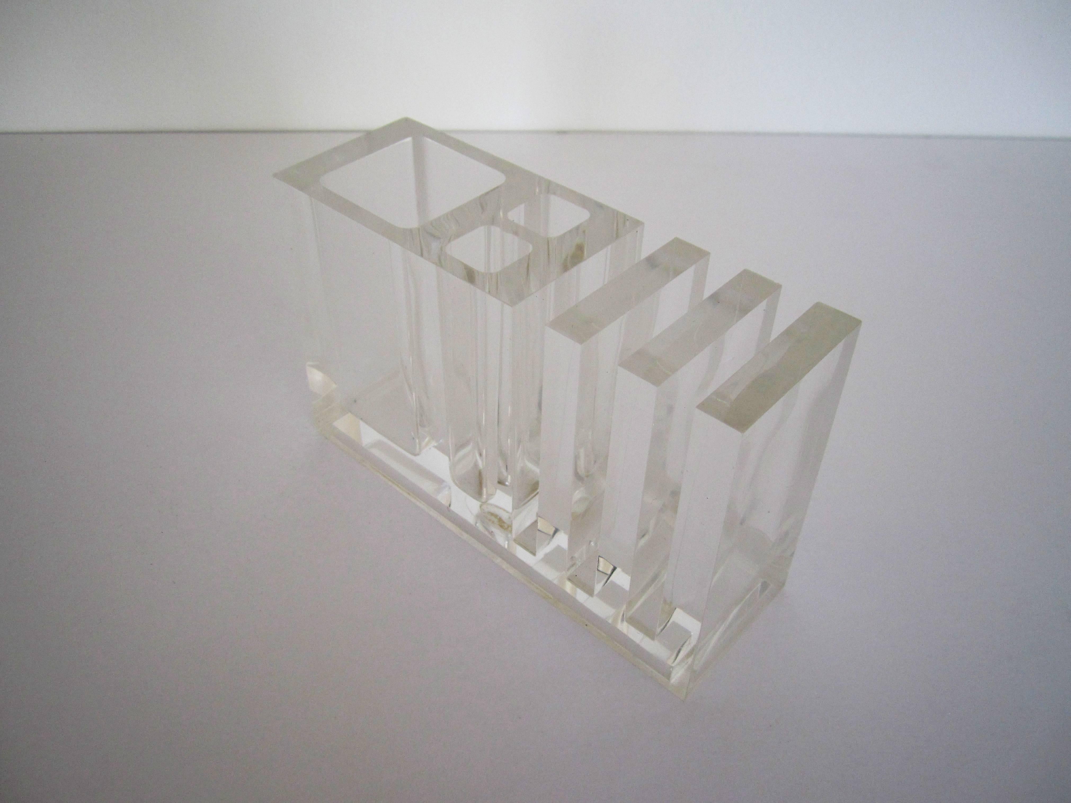 An Italian Postmodern or Modern style designer Lucite pen, pencil, and paper desk organizer/holder, Italy, circa 1980s, by Rede Guzzini. With maker's mark label on bottom 'Guzzini' 'Made in Italy,' as show in image #5. 

