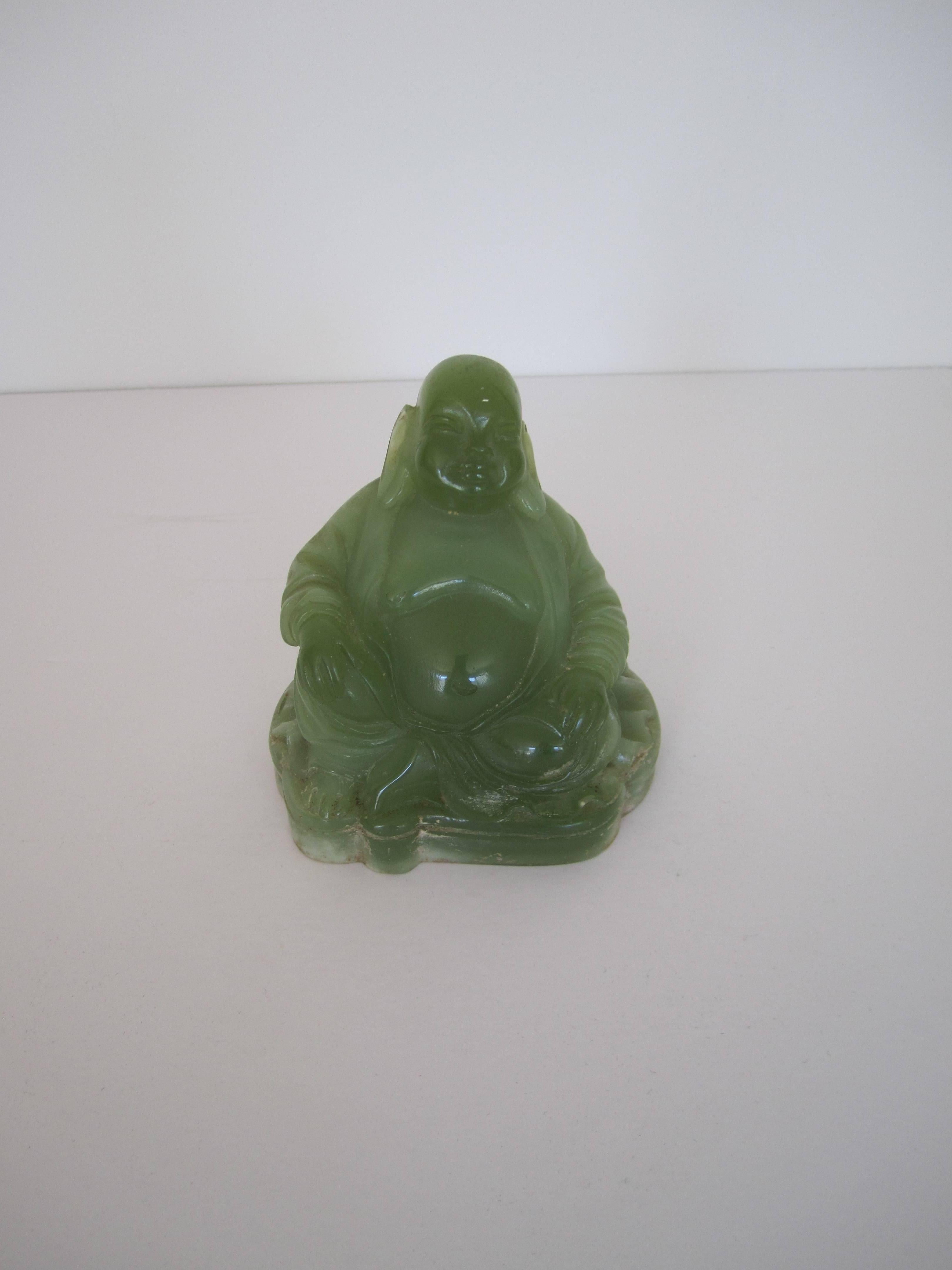 A vintage Mid-Century jade green resin seated Buddha in the style of designer Dorothy Thorpe. Buddha measures 3.5 inches high. 

Item available here online. By request, item can be made available by appointment to the Trade in New York. 

        