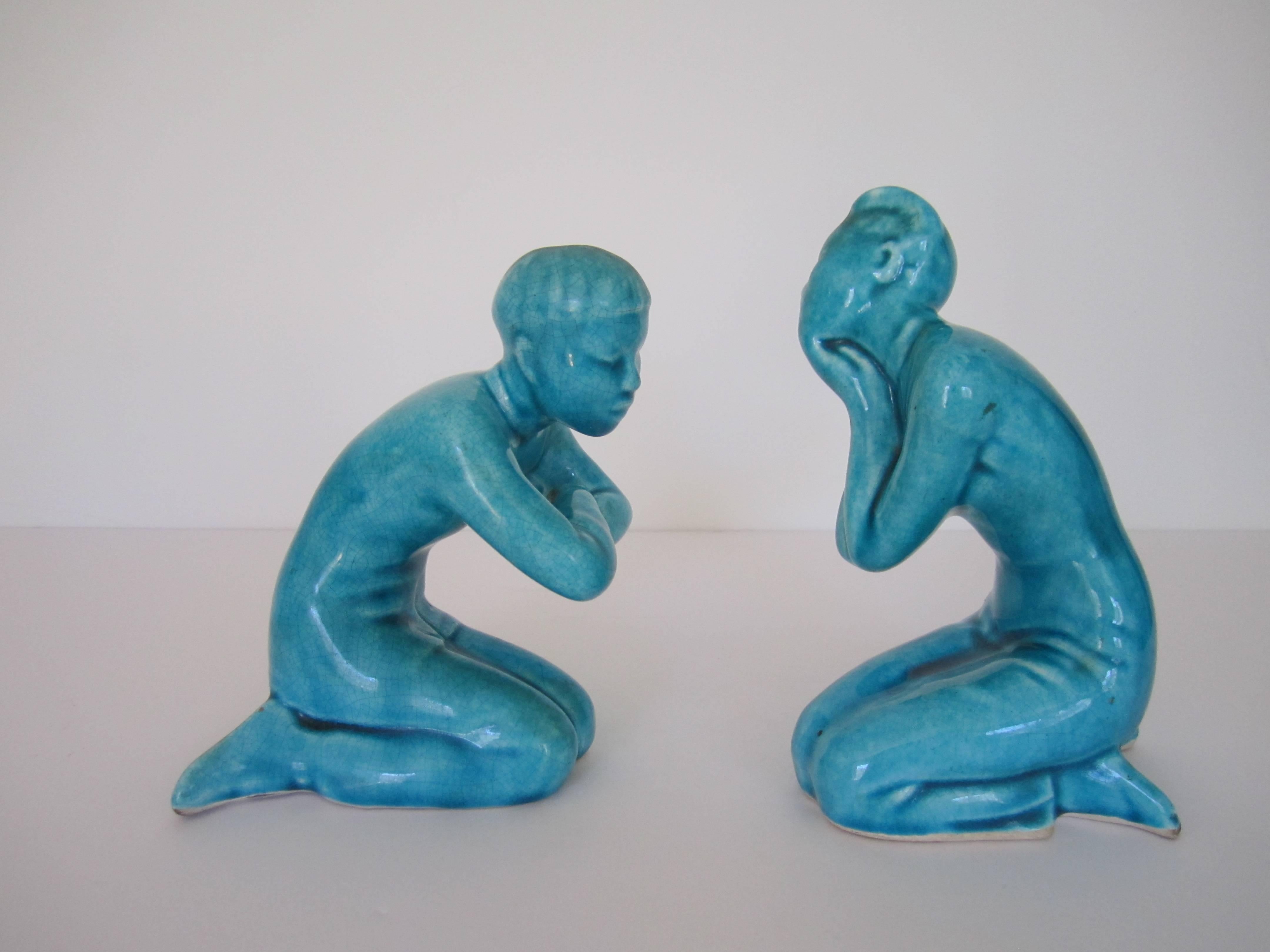 Glazed Pair of Mid-20th Century Turquoise Blue Asian Figural Ceramic Sculptures