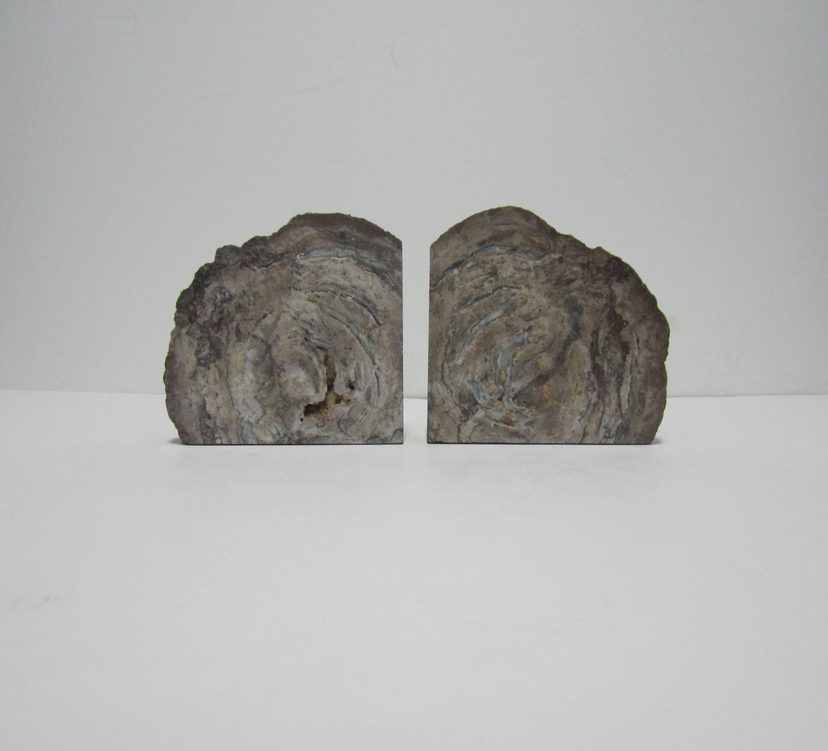 A beautiful pair of vintage natural crystal grey geode bookends. Colors include grey, gray and taupe. Pair available here online. By request, pair can be made available by appointment to the trade (in New York.)