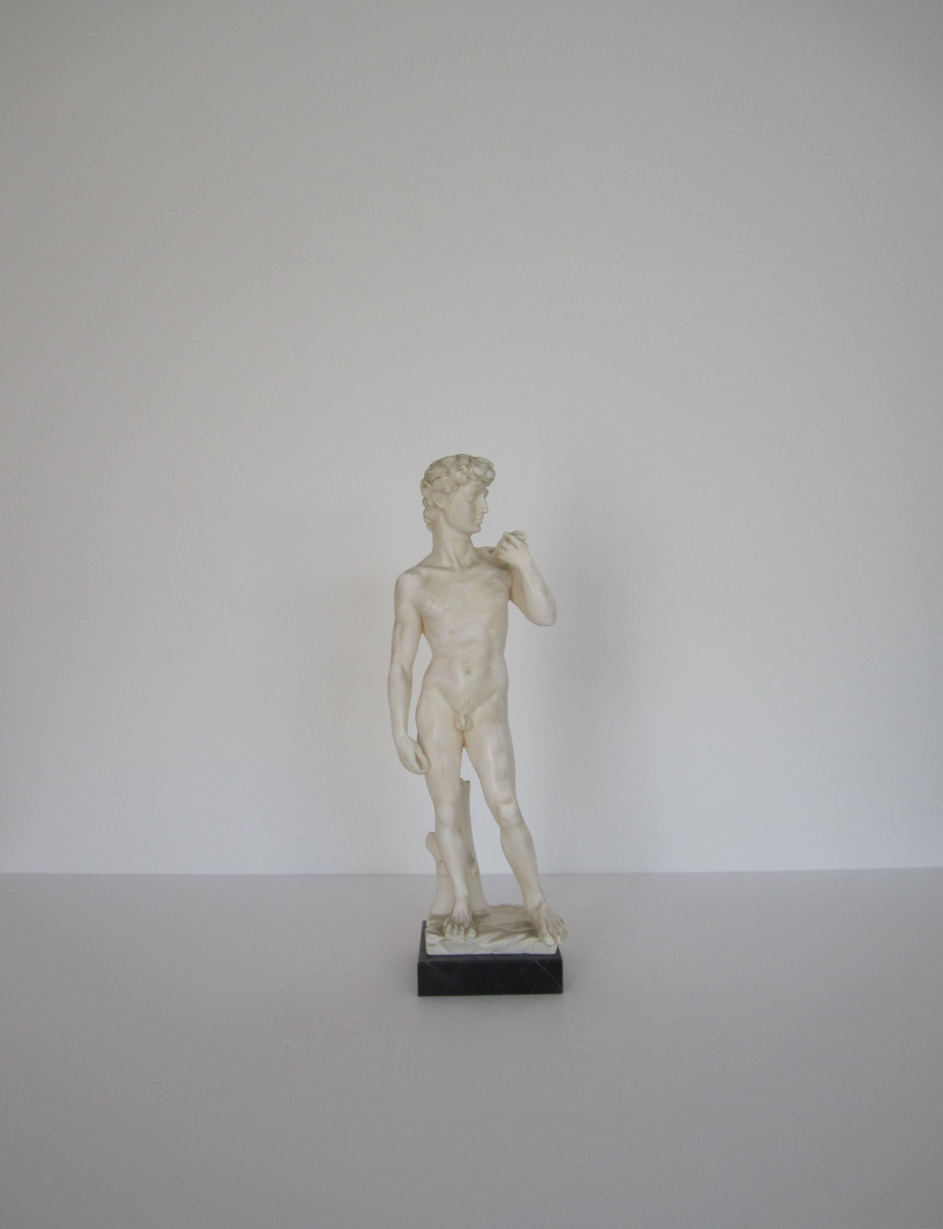 Carved Classic Italian Roman Sculpture of the 'David' on Black Marble Base For Sale