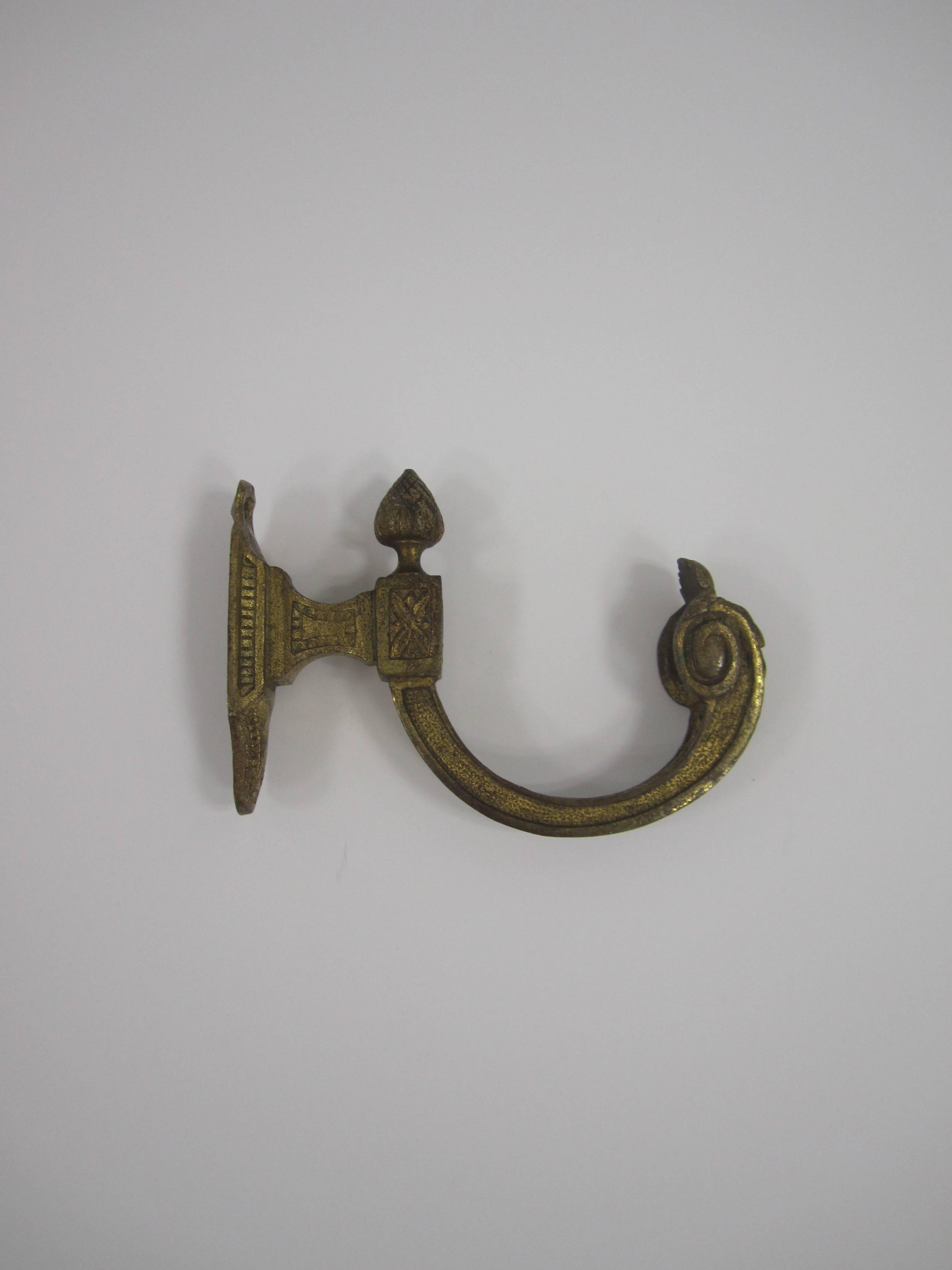 A substantial vintage gilded bronze French Louis XVI style hardware wall hook with beautiful details. 

Item available here online. By request, item can be made available by appointment to the Trade (in New York.).