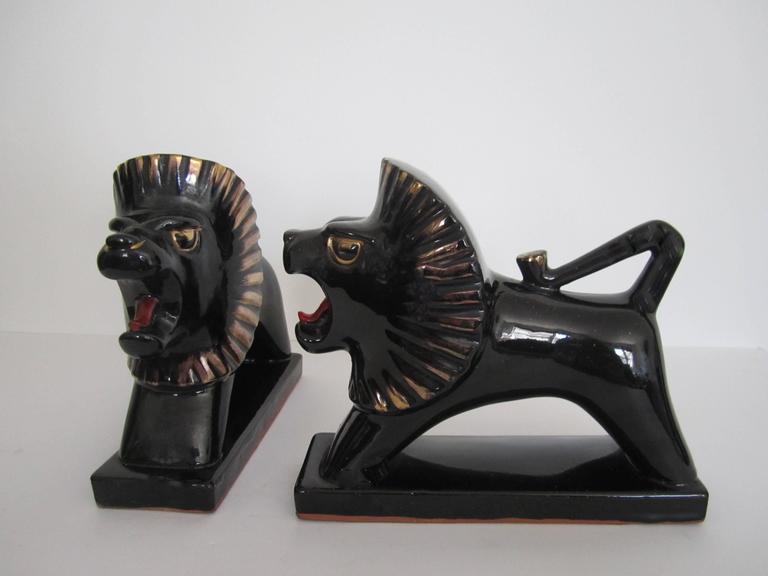 Art Deco Black and Gold Lion Bookends or Decorative Objects, Pair at