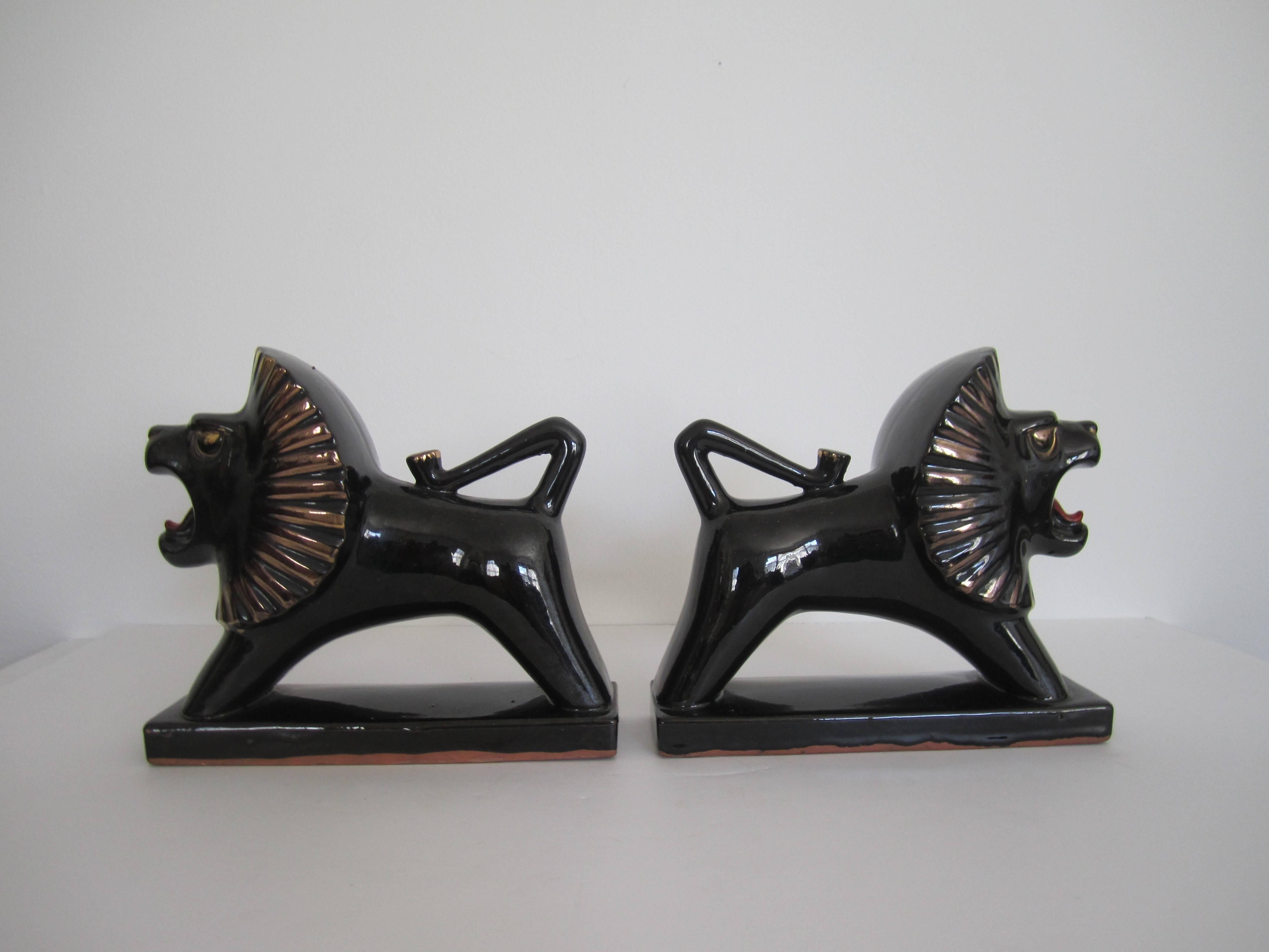 Glazed Art Deco Black and Gold Lion Bookends or Decorative Objects, Pair