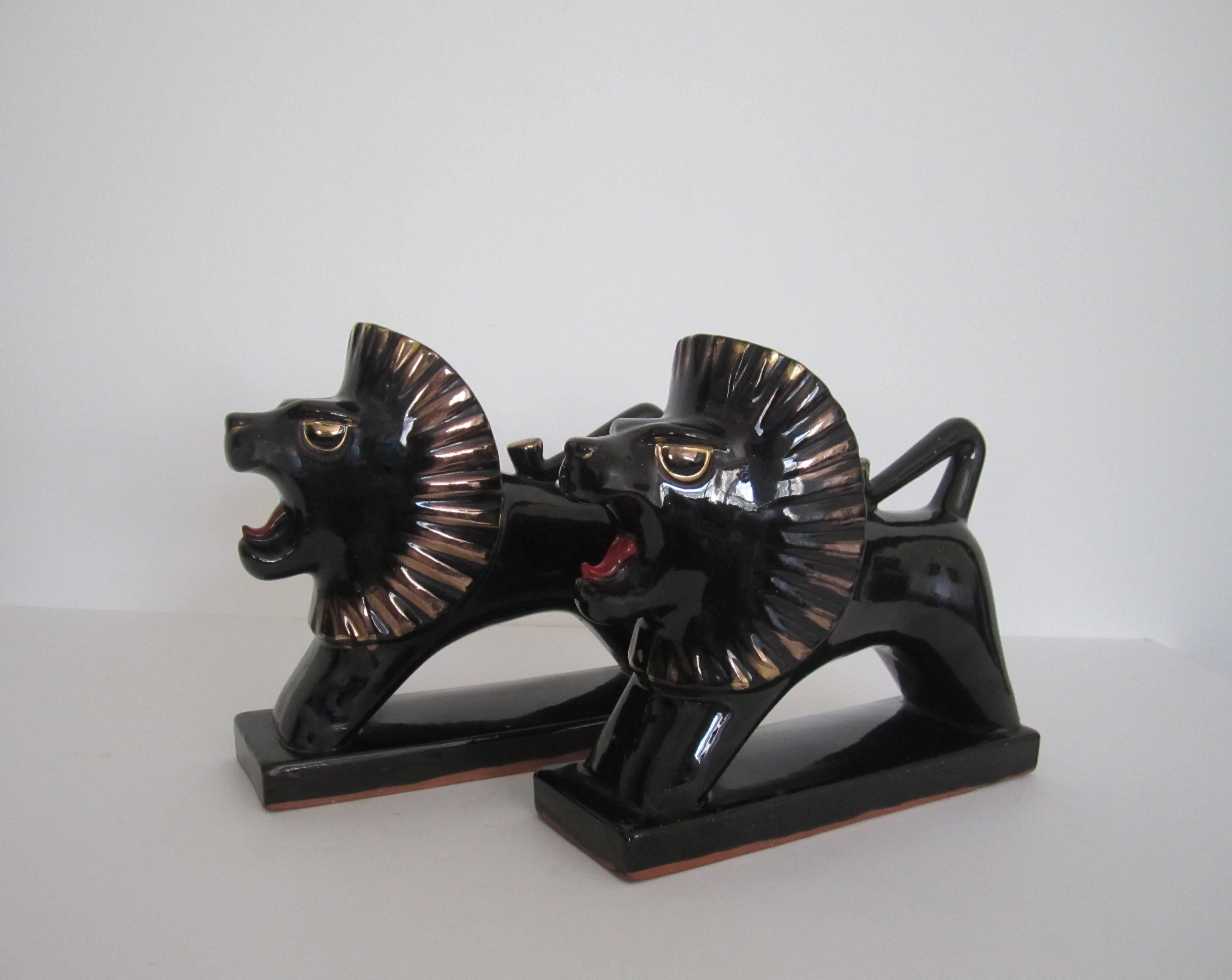 Art Deco Black and Gold Lion Bookends or Decorative Objects, Pair In Good Condition In New York, NY