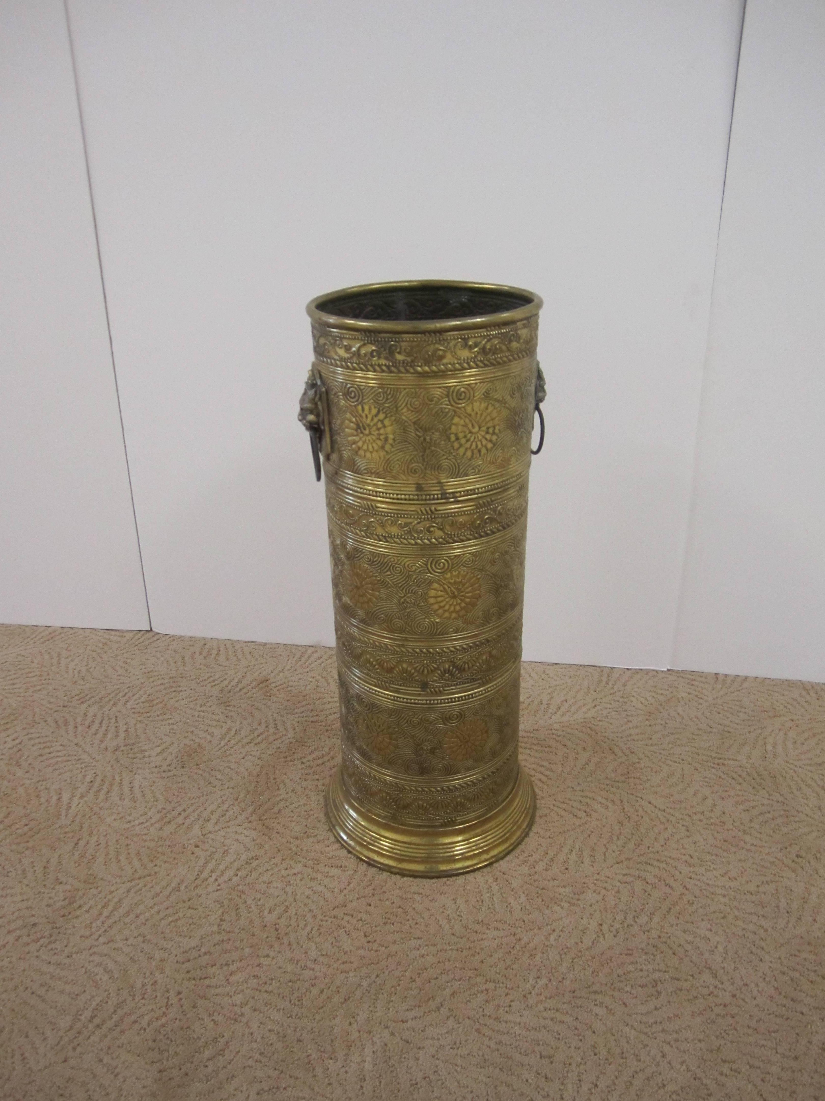 Vintage Brass Umbrella Stand with Decorative Lion Heads In Good Condition In New York, NY