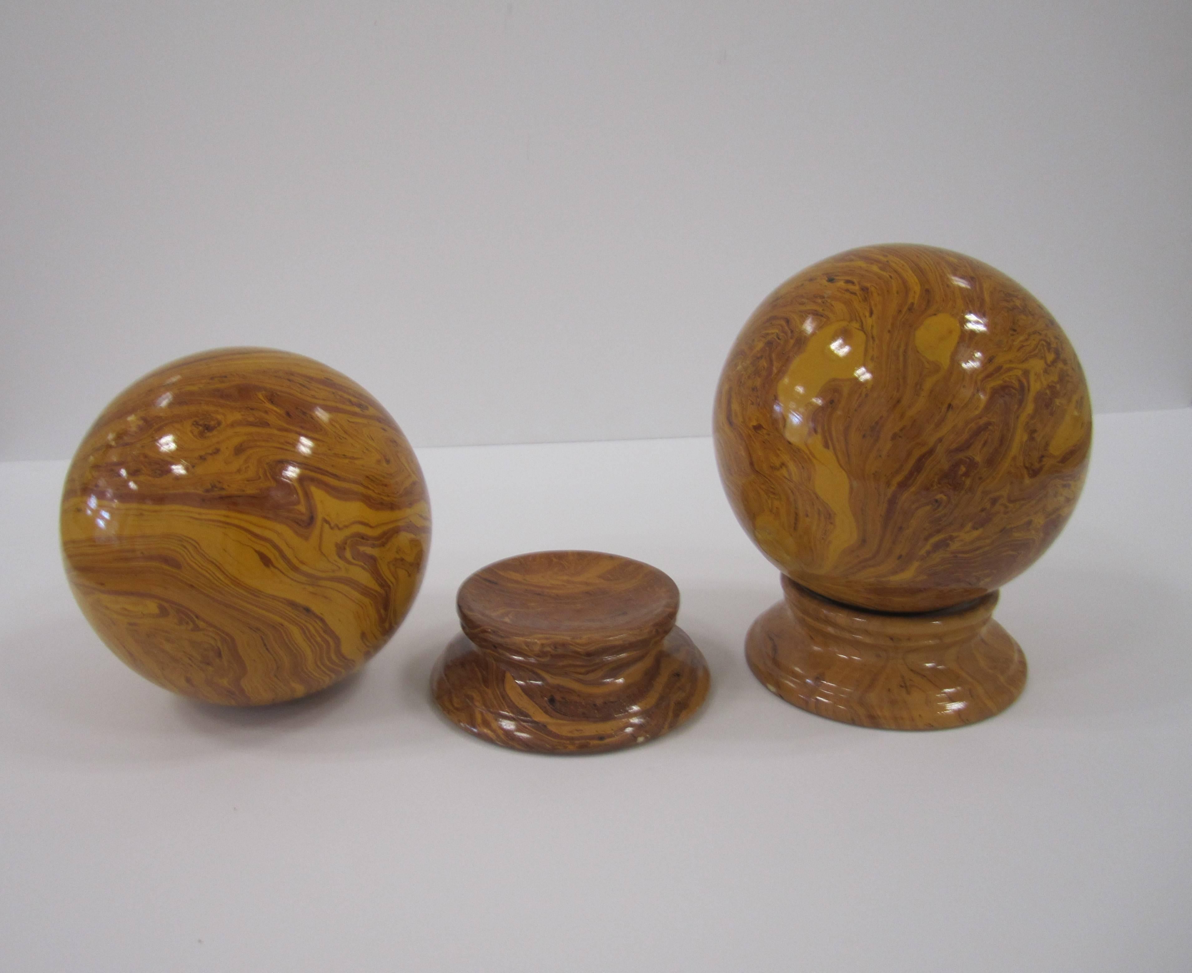 Glazed Italian Yellow Pottery Marbleized Ball Spheres Garnitures on Pedestals, Pair For Sale
