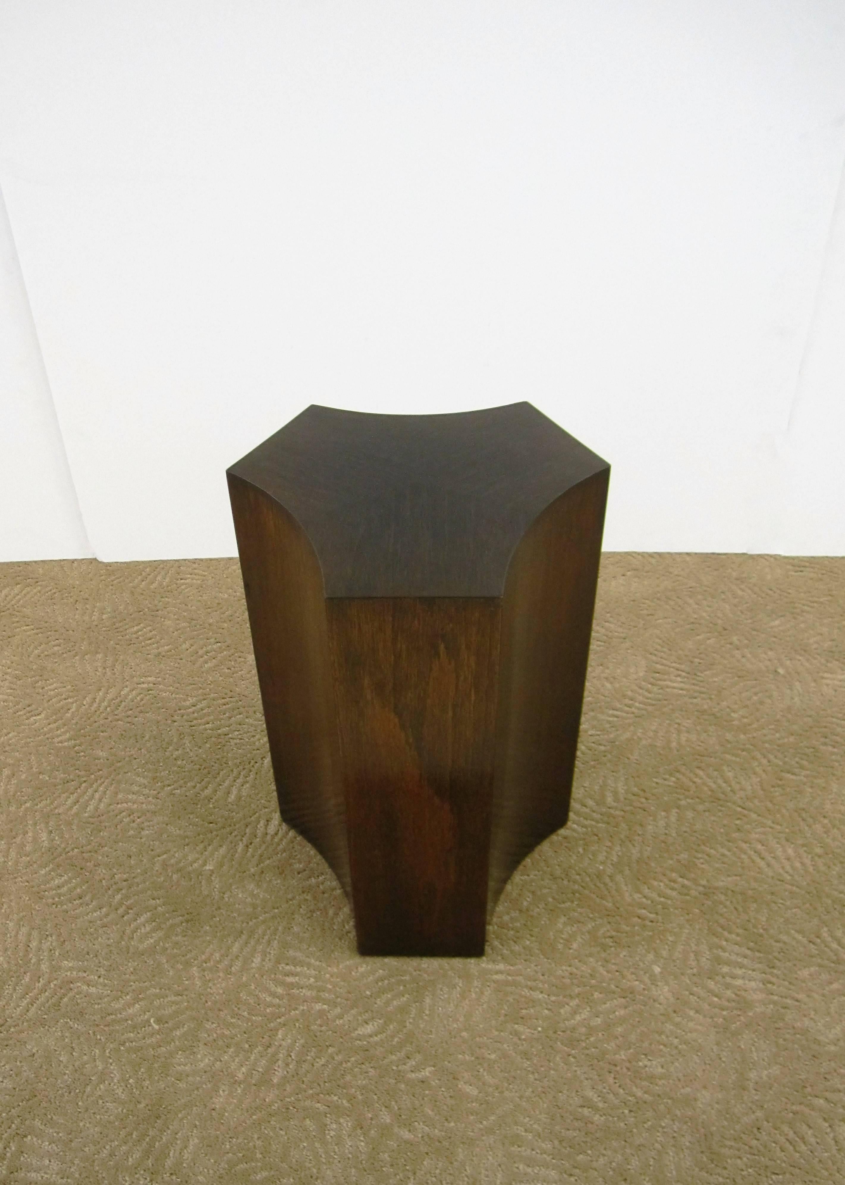 A beautiful quality and elegantly designed vintage warm wood pedestal side table in geometric form. 

Table measures: 19 in. H x 10.5 in. W x 10.5 in. D. 

Item available here online. By request, item can be made available by appointment to the
