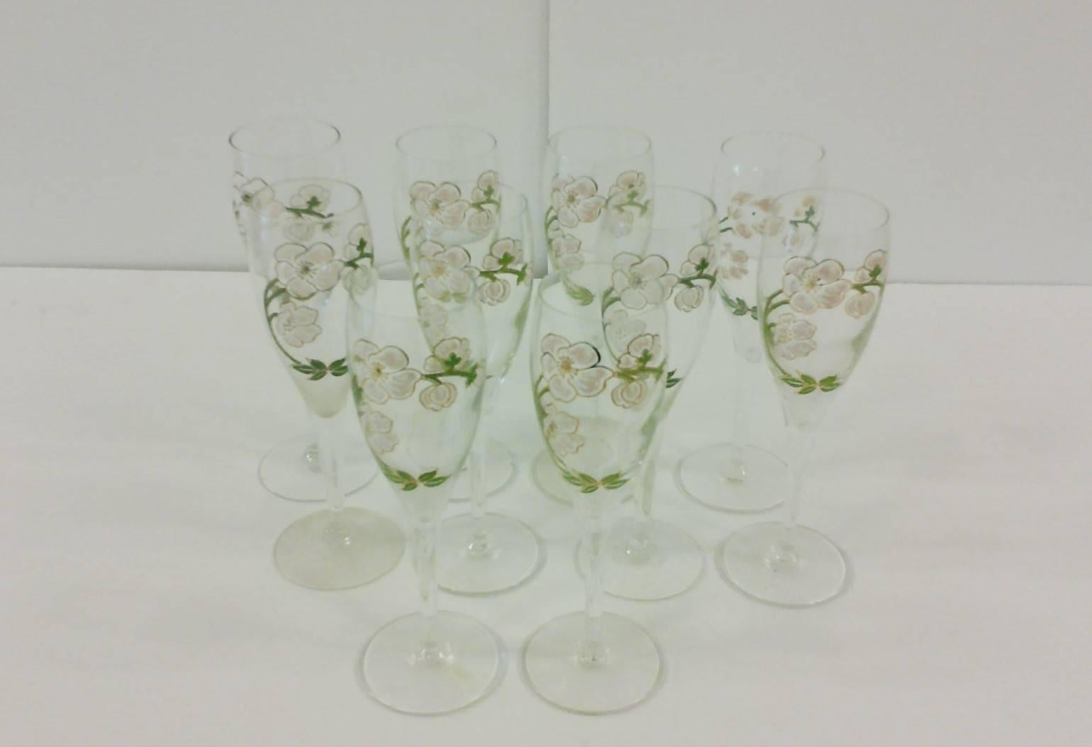 A beautiful set of ten (10) vintage Perrier-Jouet French champagne glasses. 
Beautiful and iconic floral motif. Set of 10 available here online. By request, set can be made available by appointment to the Trade (in New York.) 