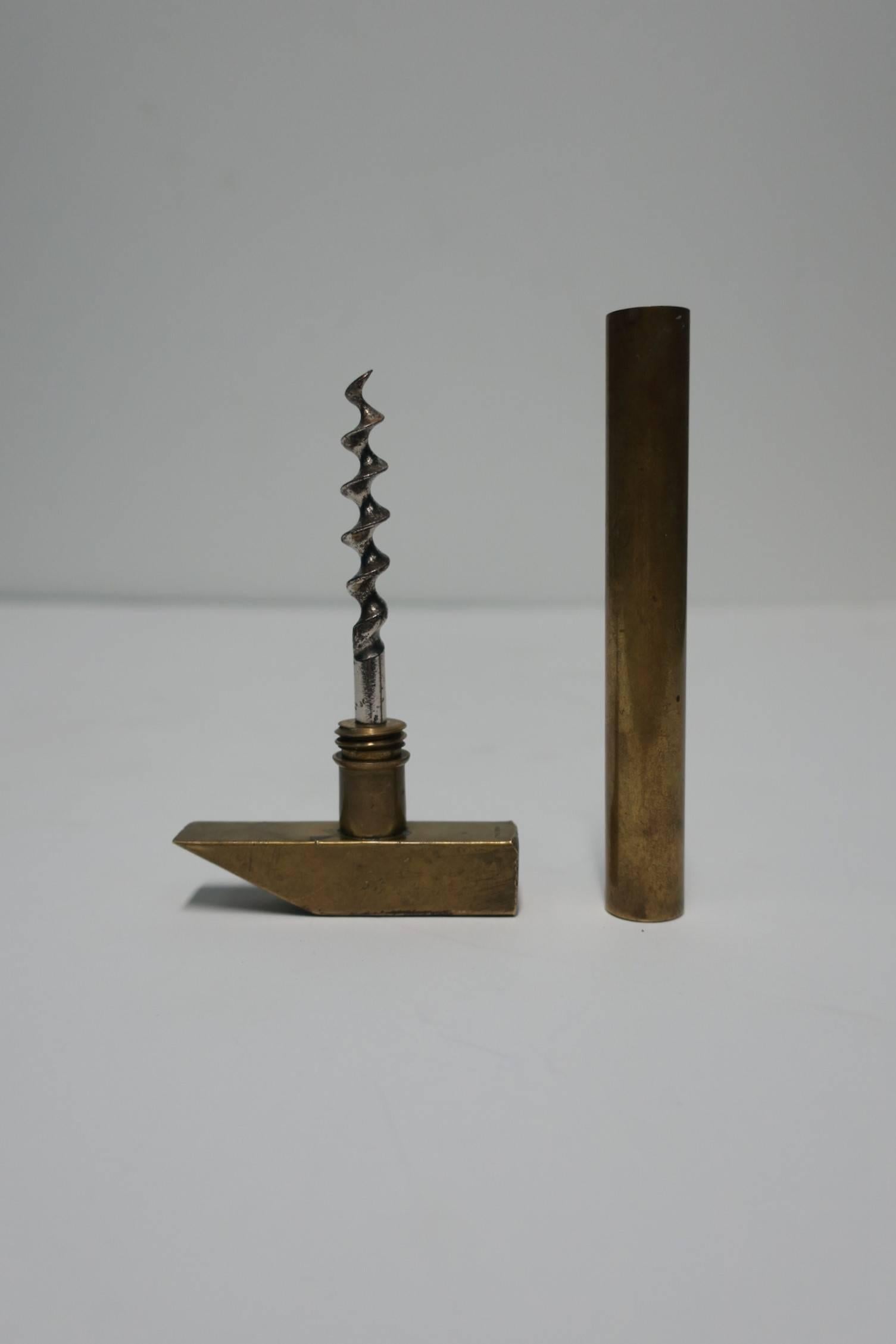 A vintage Italian brass hammer tool corkscrew wine bottle opener. Beautifully designed solid brass tool with twist-off handle that reveals 'screw'. Marked 'Made in Italy' show in image #6. Great for a bar or bar cart.

Measures: 5.5 in. x 2.5 in.
