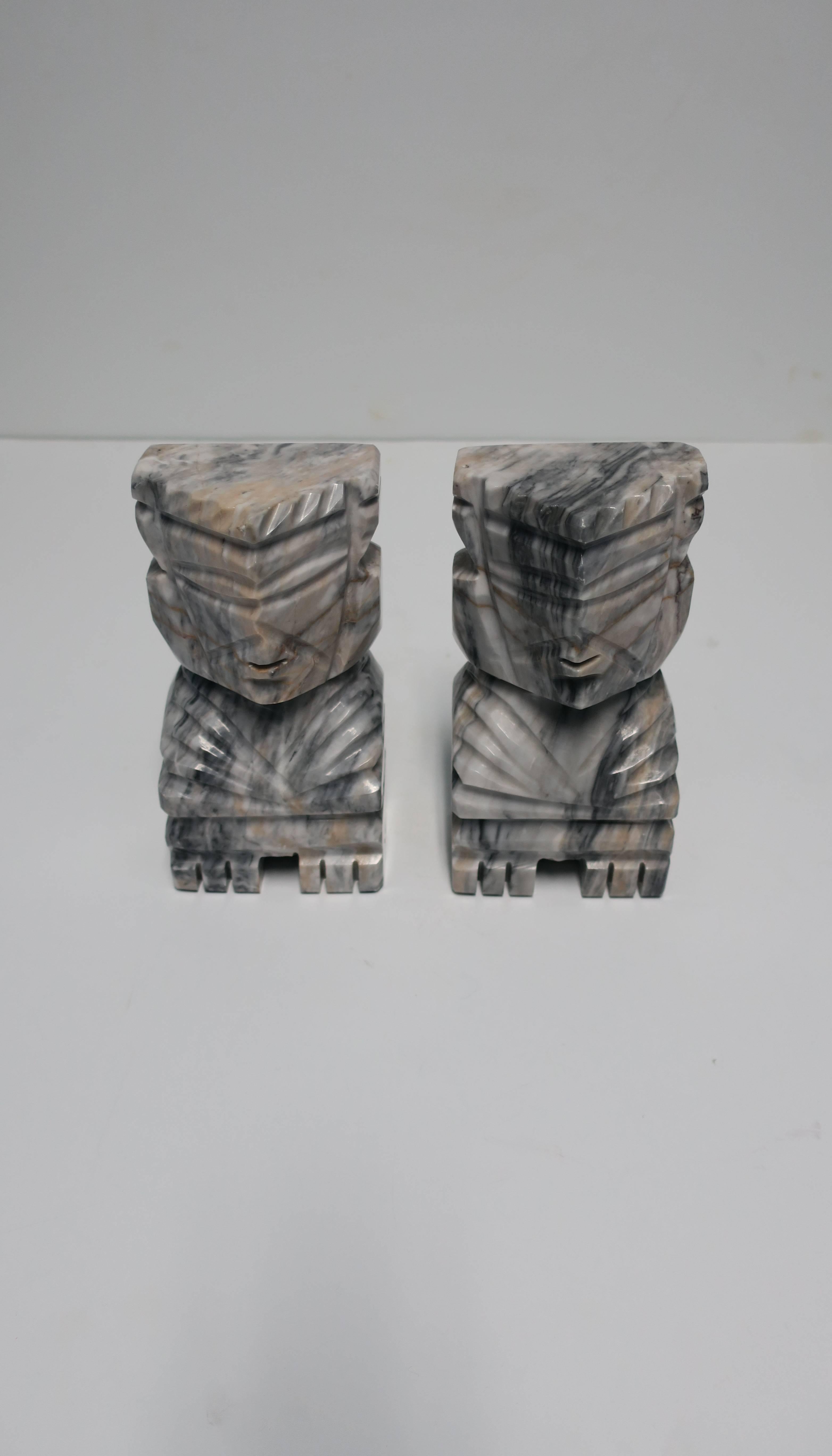 Carved Tribal Marble Bookends For Sale
