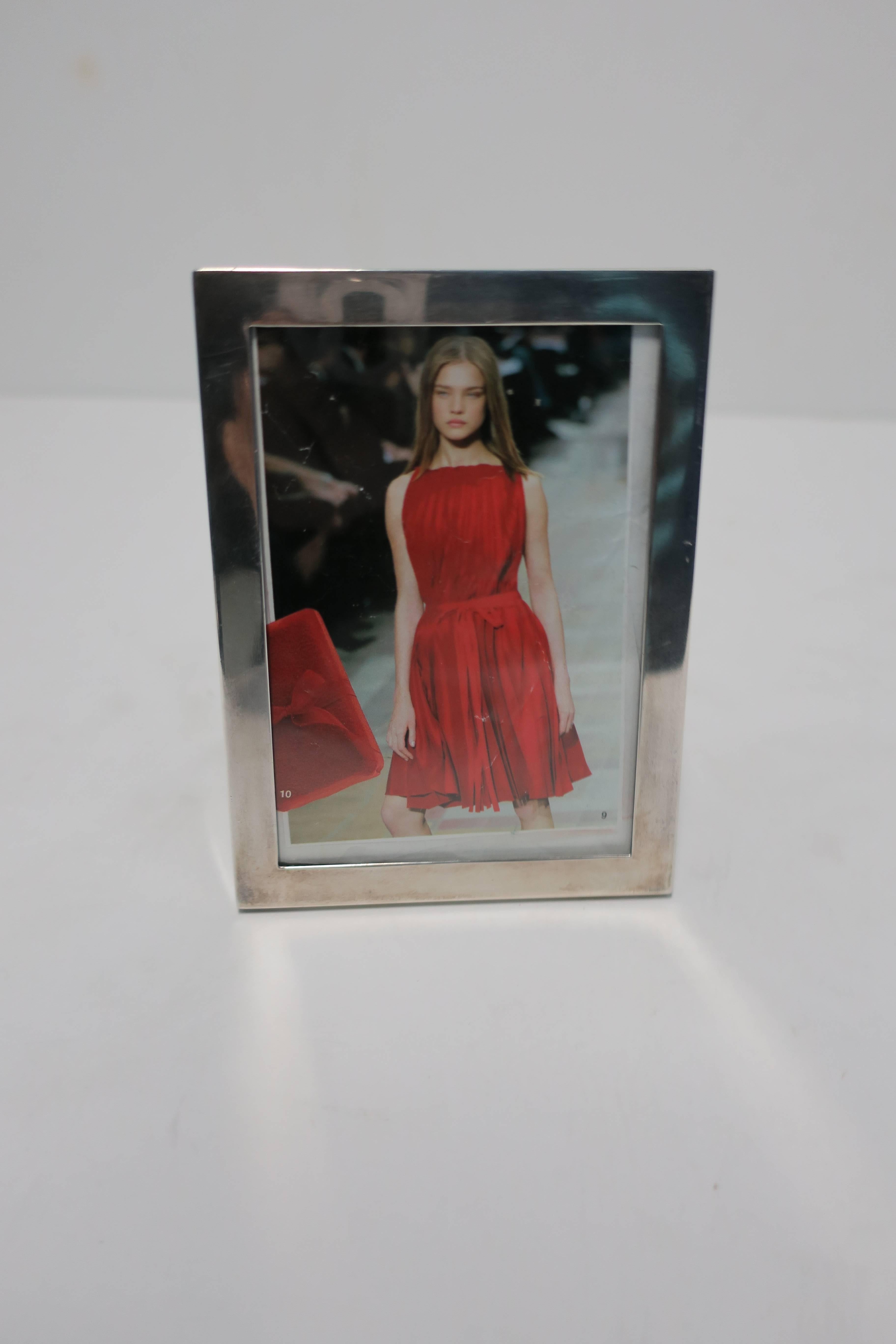 A beautiful Modern handmade Cartier picture frame in sterling silver. Frame can sit horizontally or vertically. With maker's mark (Cartier), as well as marked 