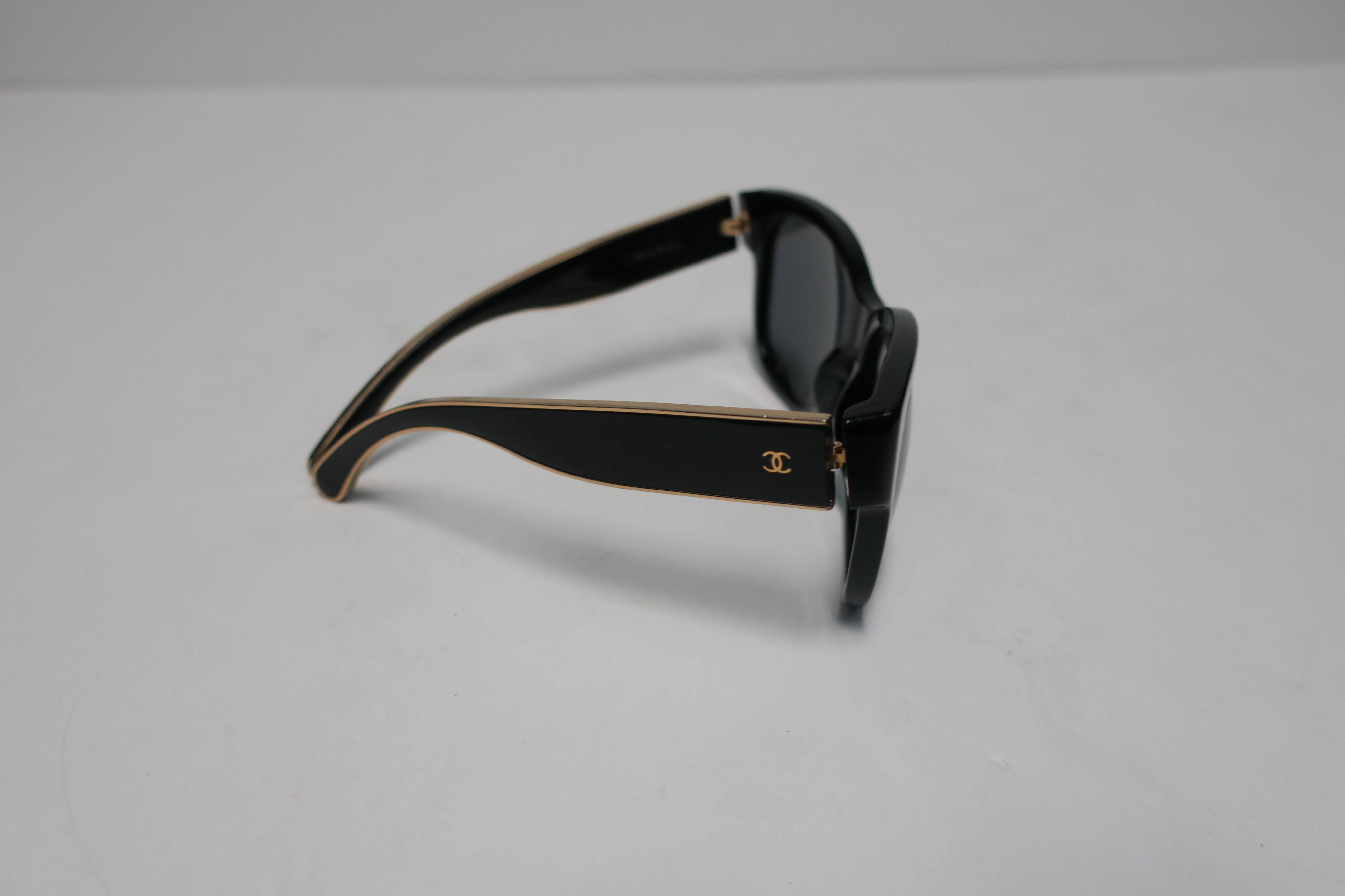 Contemporary Black and Gold Chanel Sunglasses