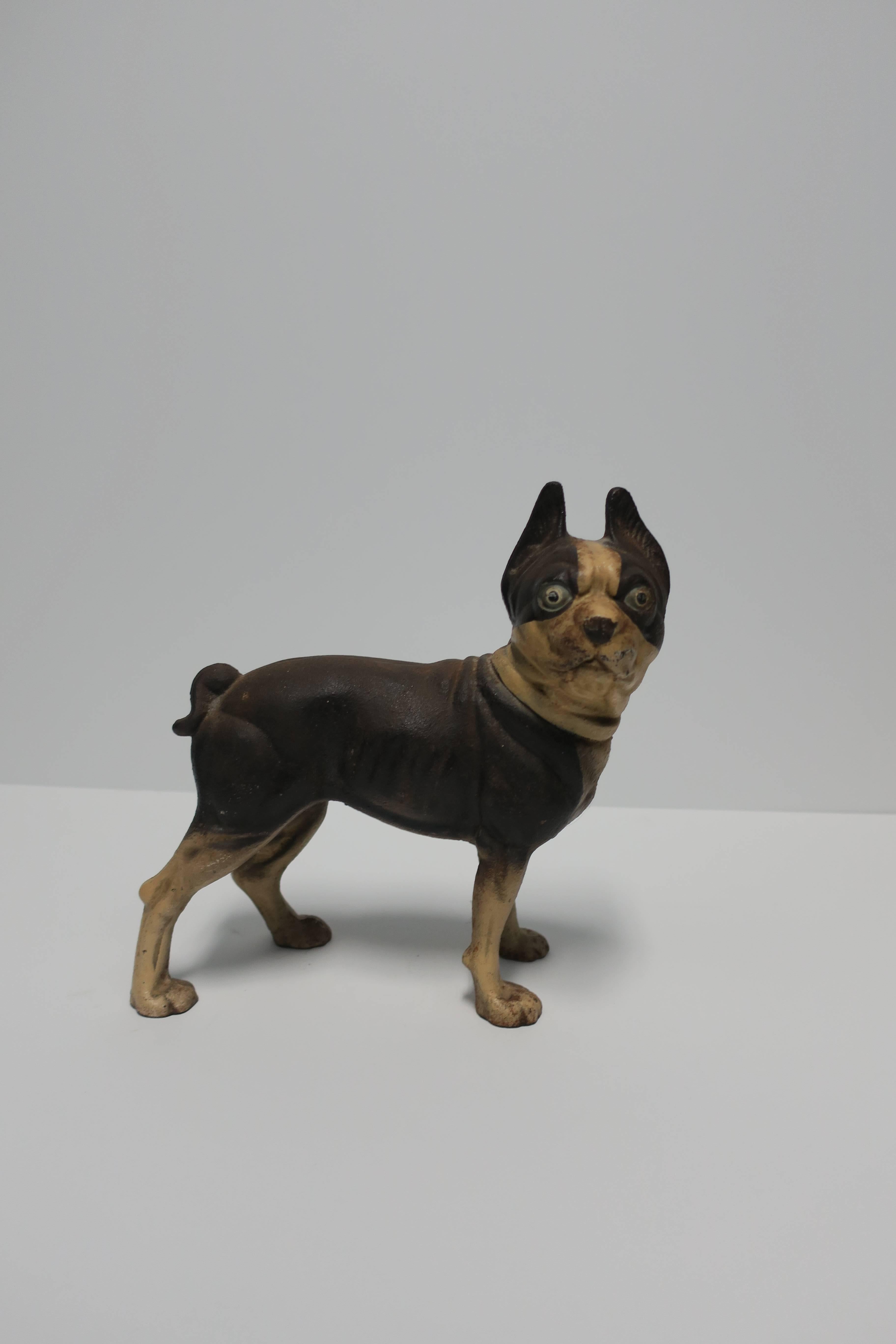 A substantial vintage cast iron Boston Terrier dog sculpture or doorstop, circa 1930s. 

Measurements include: 10 in. H x 9.5 in. W x 4.75 in. D. 

Item available here online. By request, item can be made available by appointment to the Trade (in
