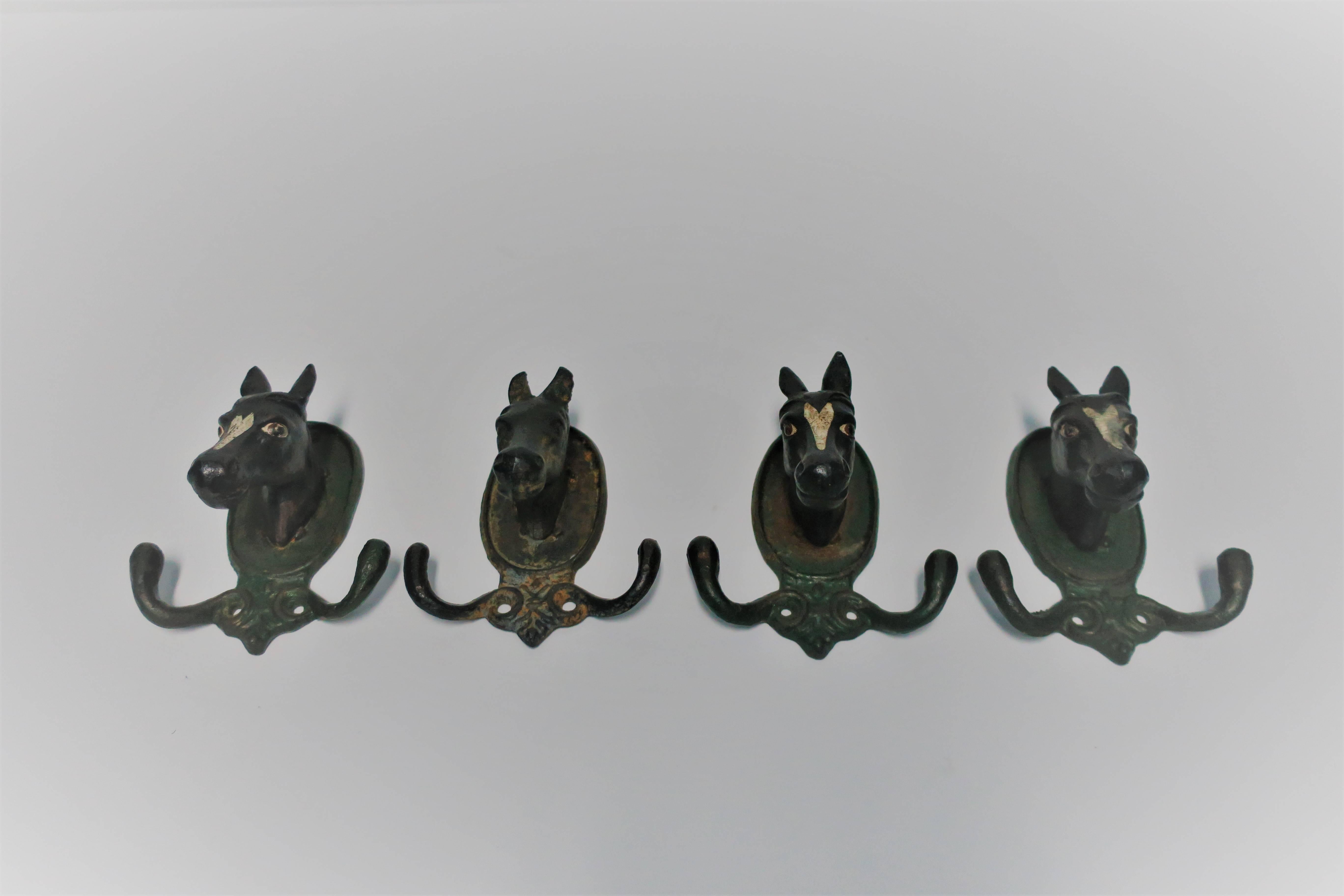 Folk Art Set of Four Vintage Horse or Equine Iron Hardware Wall Hooks