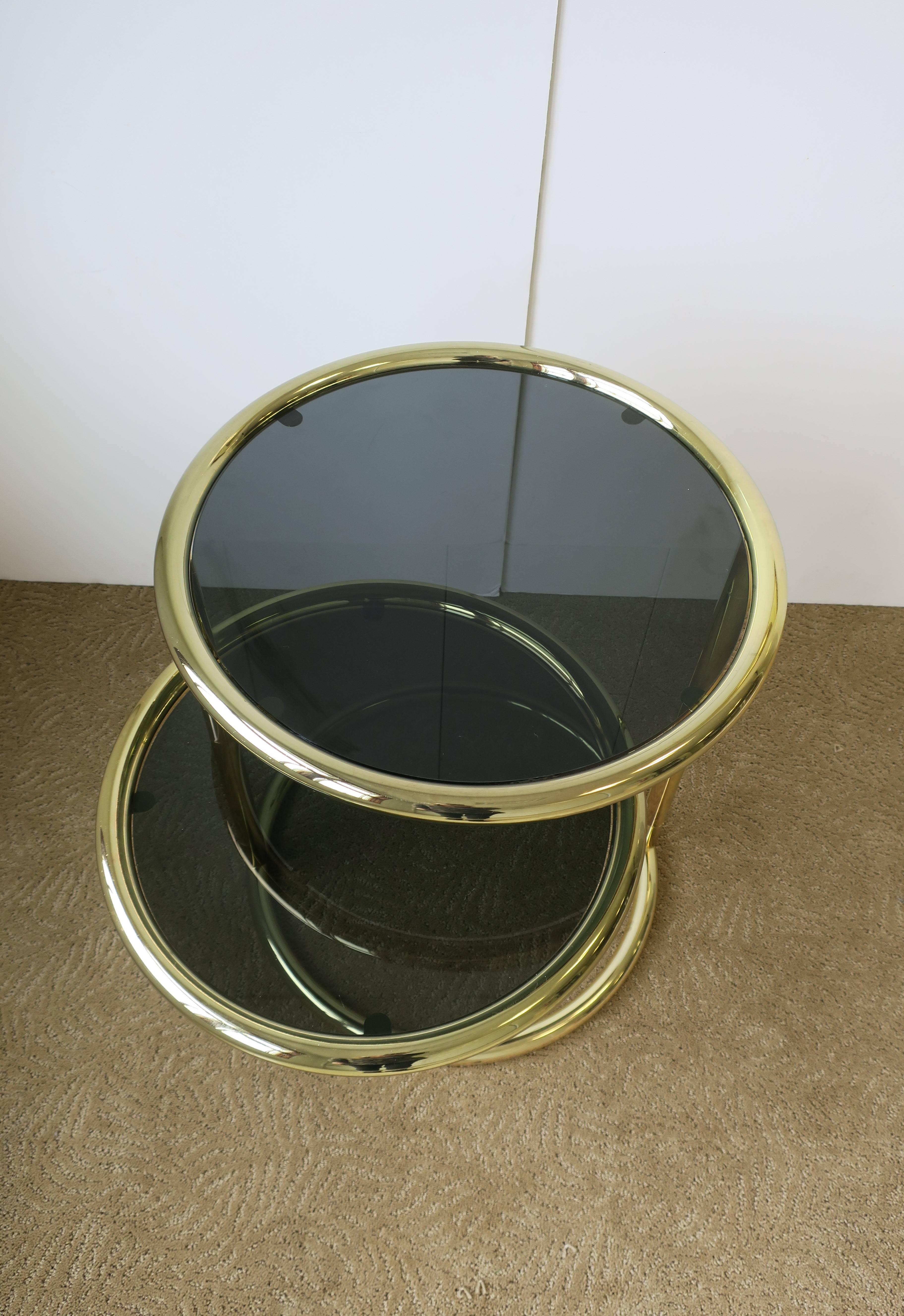 Modern Swivel Round Brass and Glass Side Table After Milo Baughman, ca. 1970s In Good Condition In New York, NY