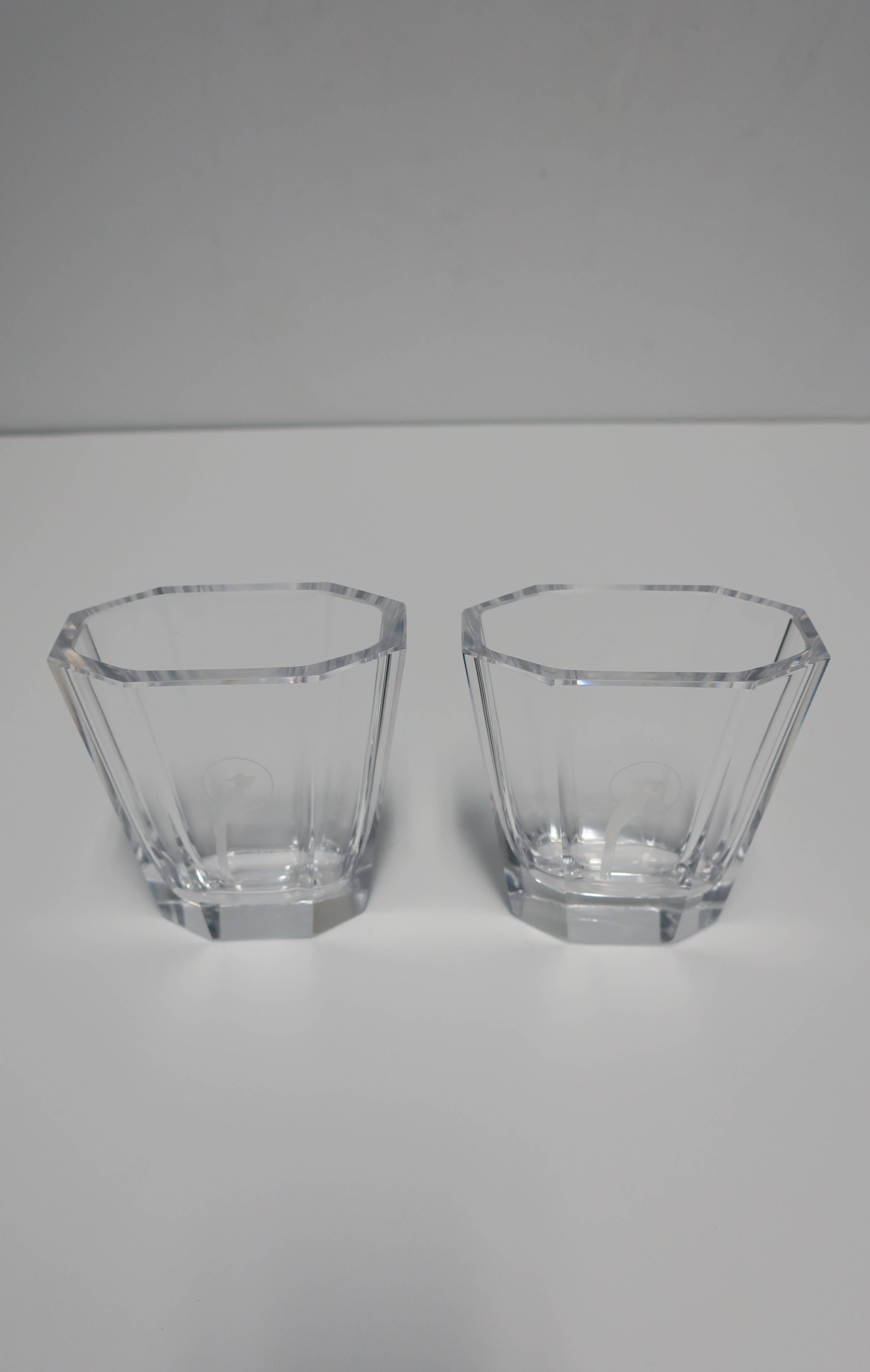 A beautiful petite pair of Scandinavian Modern Art Deco crystal octagonal vases with etched Parrot bird design on front, by Kosta Boda, circa early to mid-20th century, Sweden. Signed and numbered on bottoms as shown in last two images. Very good