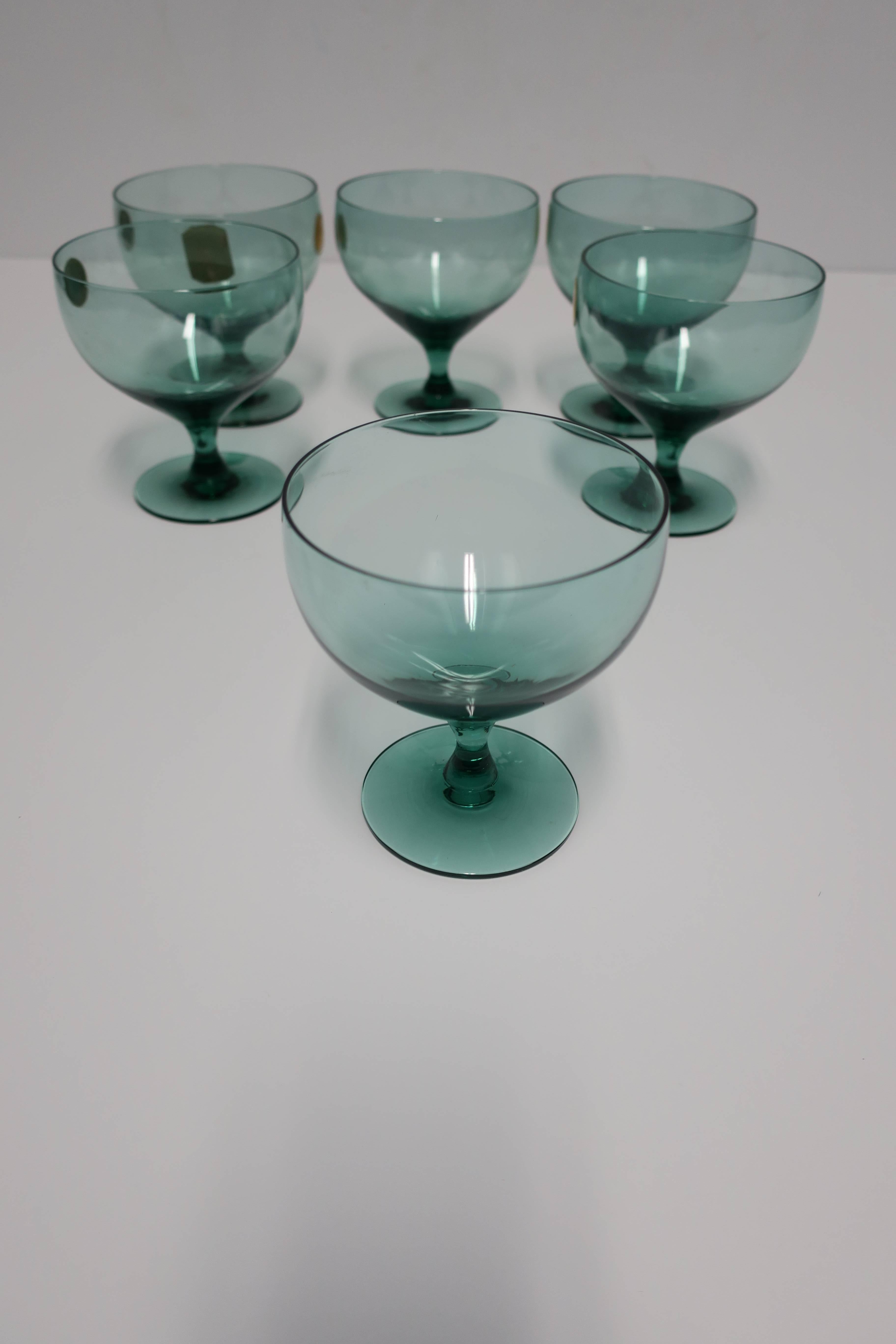 A beautiful set of six (6) designer hand-blown Mid-Century Modern blue-green or seafoam green glasses for Champagne or cocktails, etc. These coupe or goblets, measuring 4.13