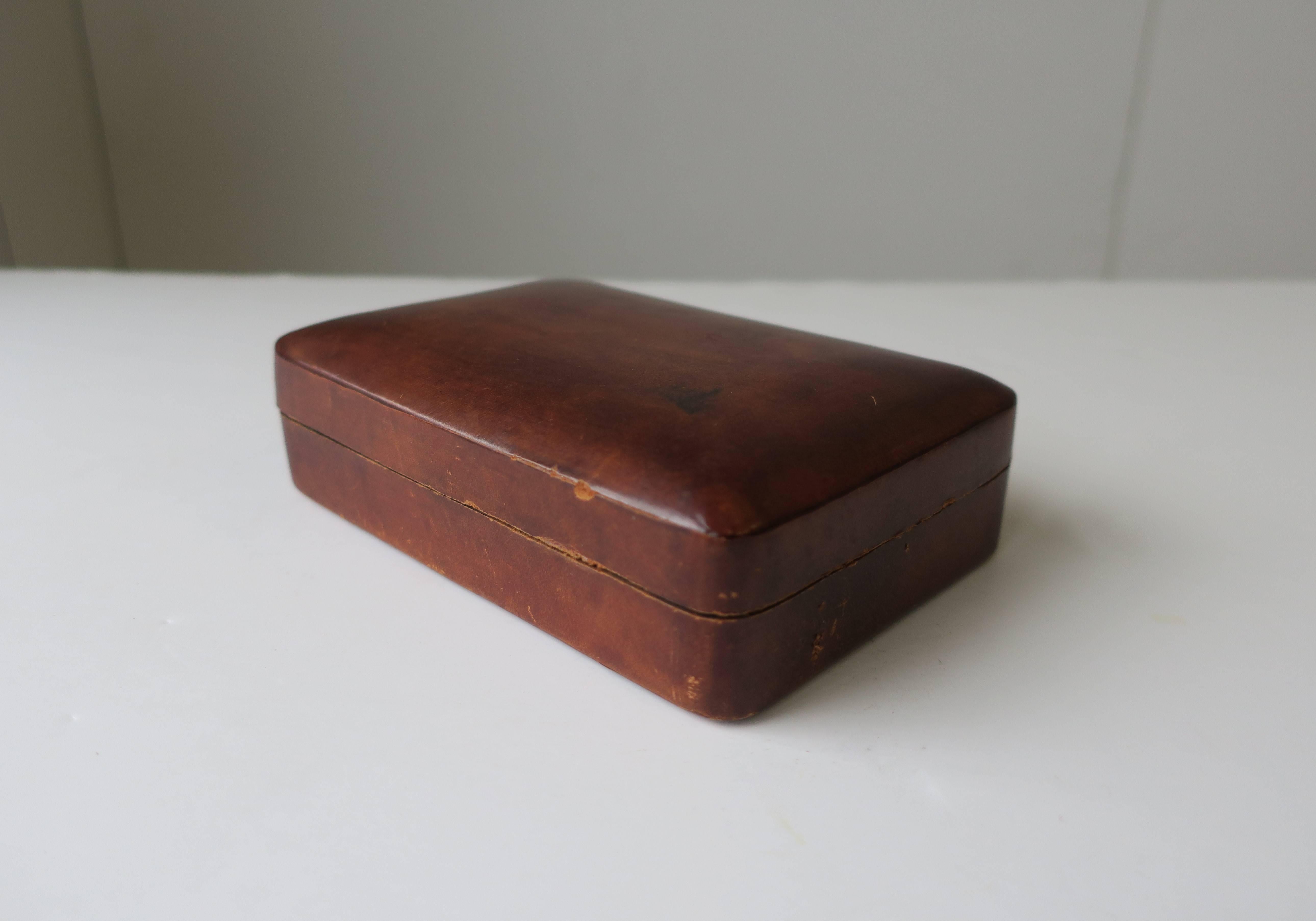 A beautiful vintage Italian all leather jewelry or vanity box with gold foil embossing on inside reading: Leonardo da Vinci. Made in Italy. 

Item available here online. By request, item can be made available by appointment to the trade in New