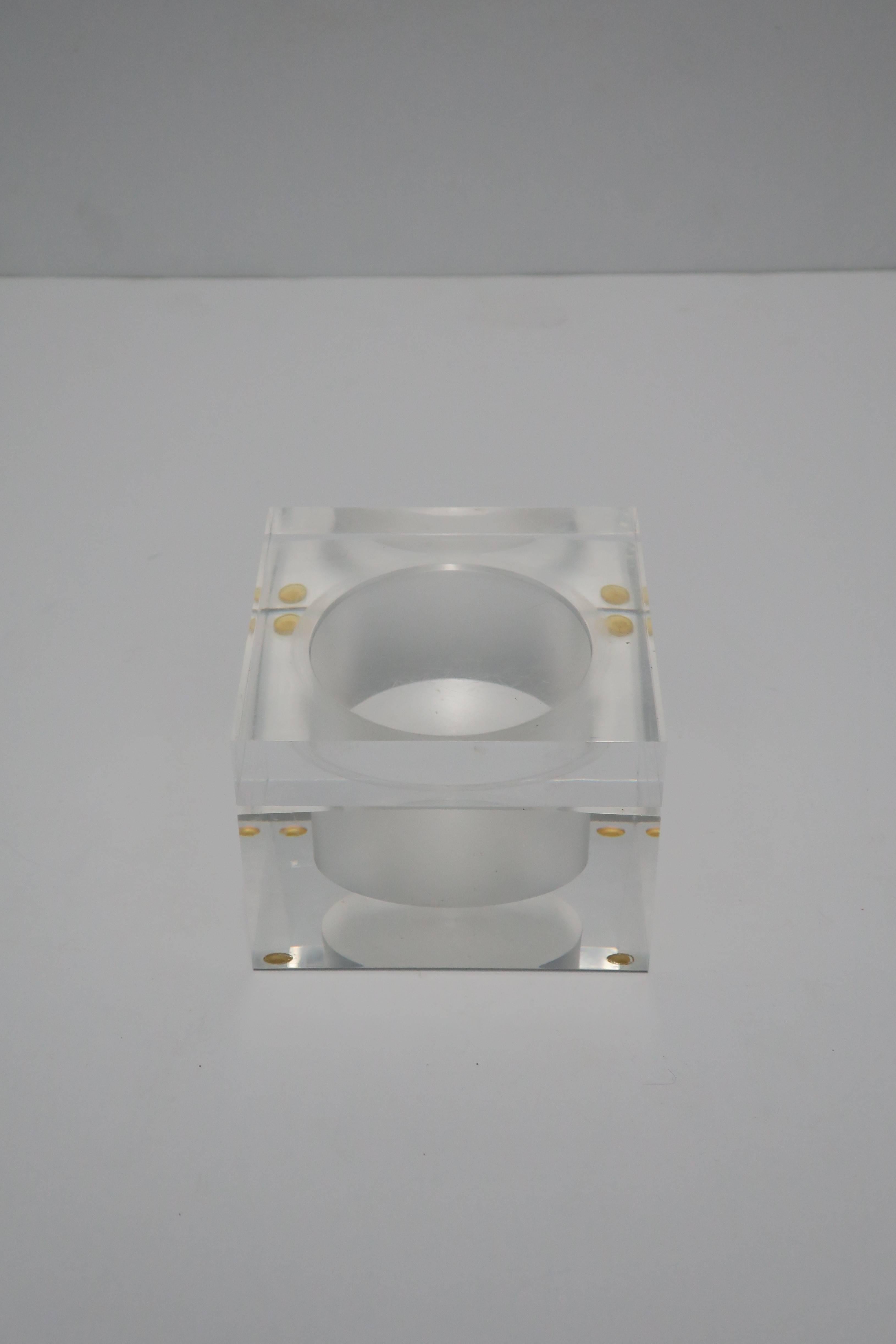 A square Lucite jewelry or trinket box, circa late-20th century, 1990s. Great to hold jewelry or other small items on a vanity, desk, nightstand table, etc. Box measures: 3.5