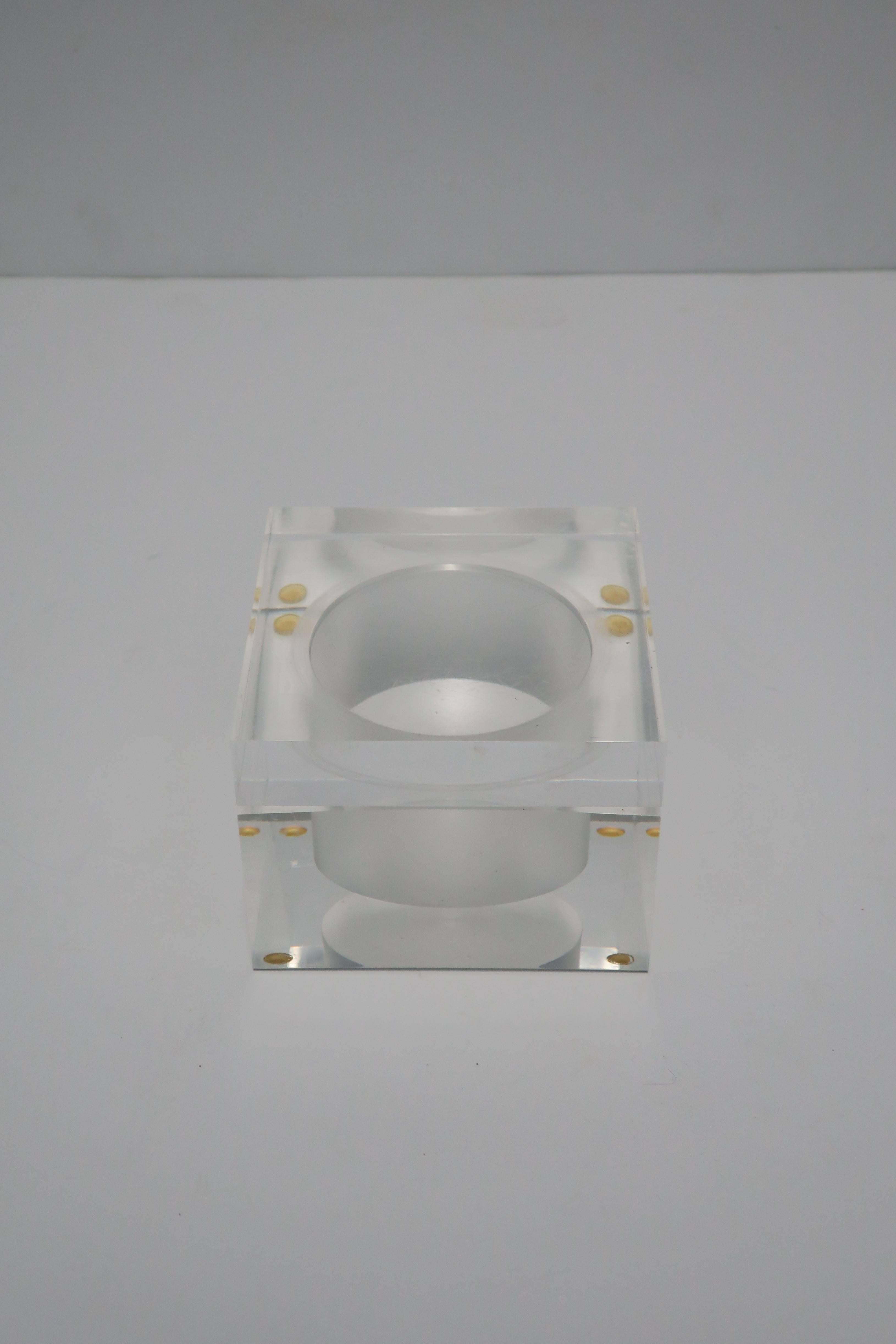 A square Lucite jewelry or trinket box, circa 1990s. Great to hold jewelry or other small items on a vanity, desk, nightstand table, etc. Box measures: 3.5