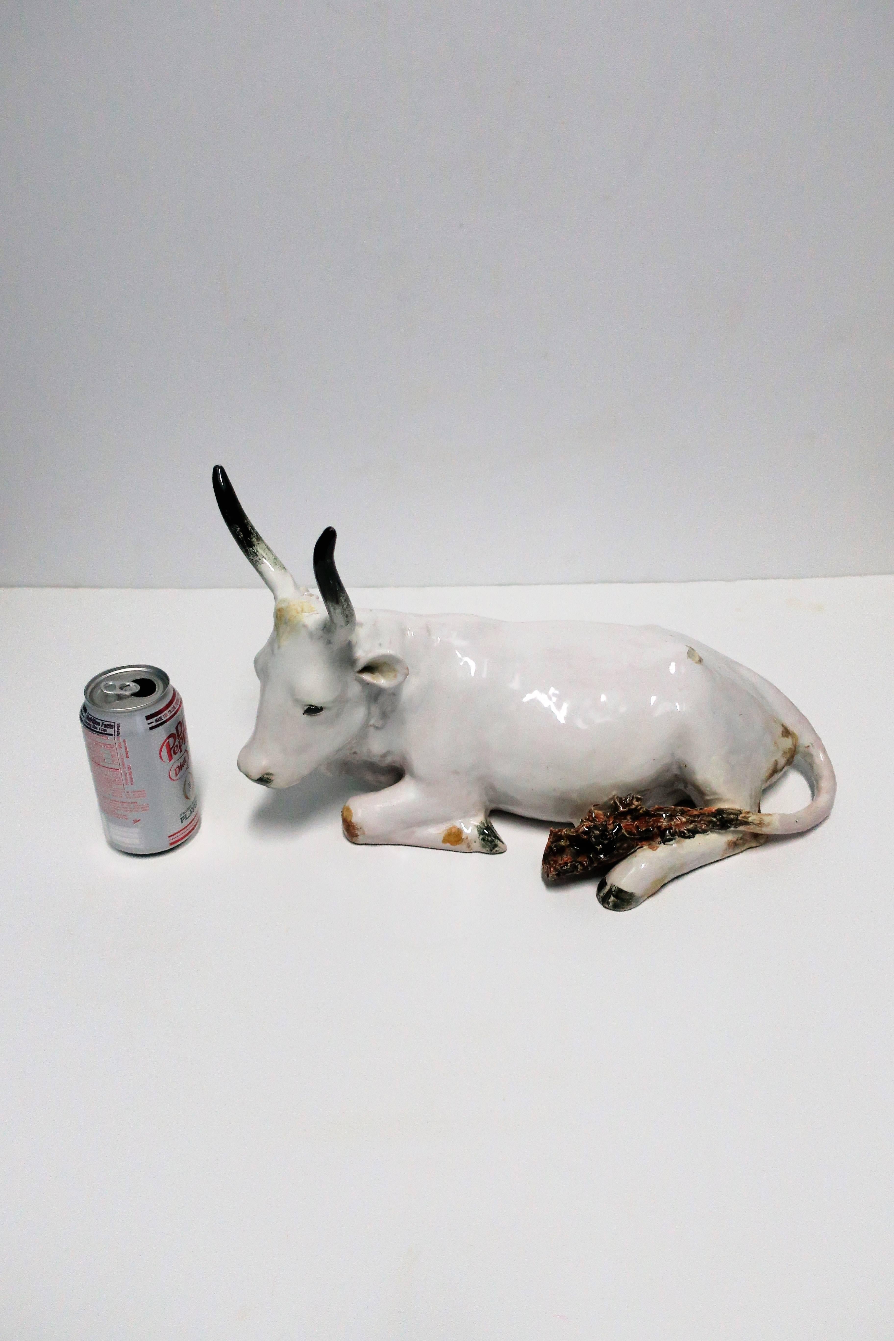 white ceramic cow