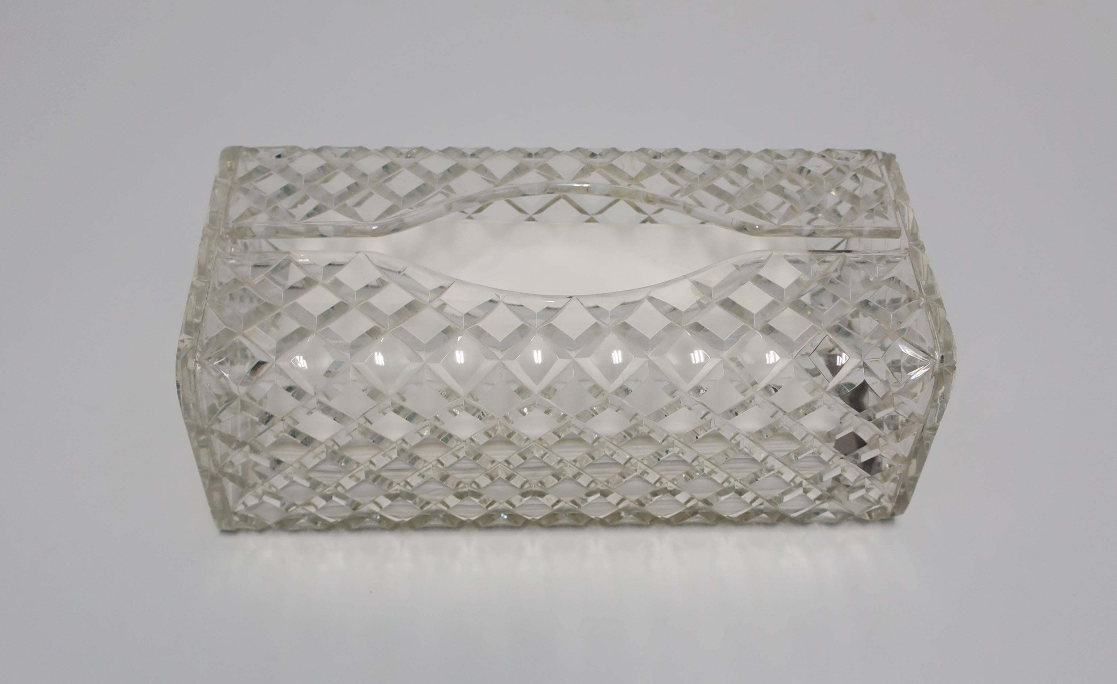 A beautiful Mid-Century Lucite tissue box with quilted design, circa 1960s. 

Item available here online. By request, item can be made available by appointment to the Trade in New York.