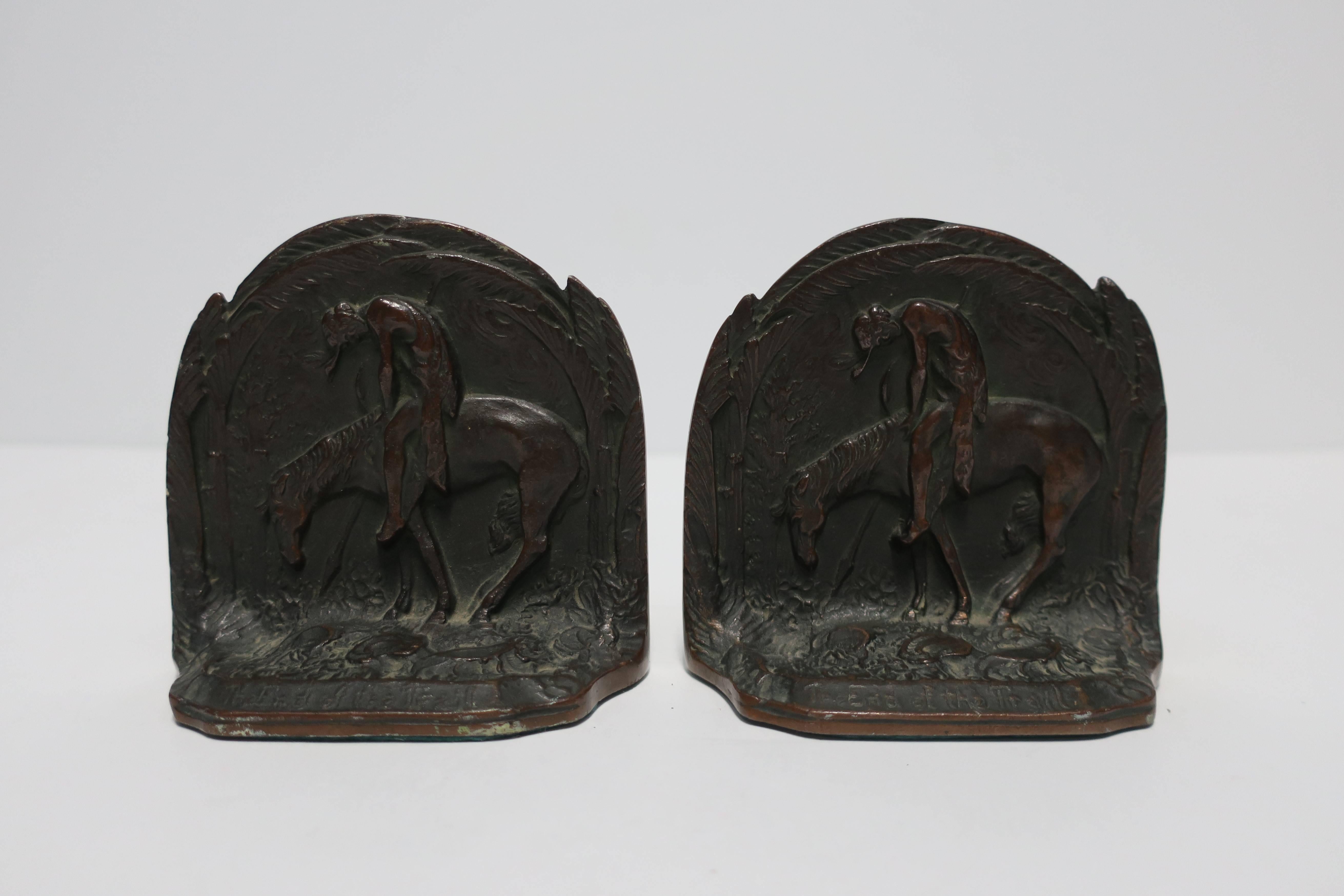 Pair/set available here $475
A beautiful detailed pair of early 20th Century American solid bronze horse and rider bookends. Engraved on front, 'End of The Road', and on back, 'Solid Bronze', as show in images.

Pair available here online. By