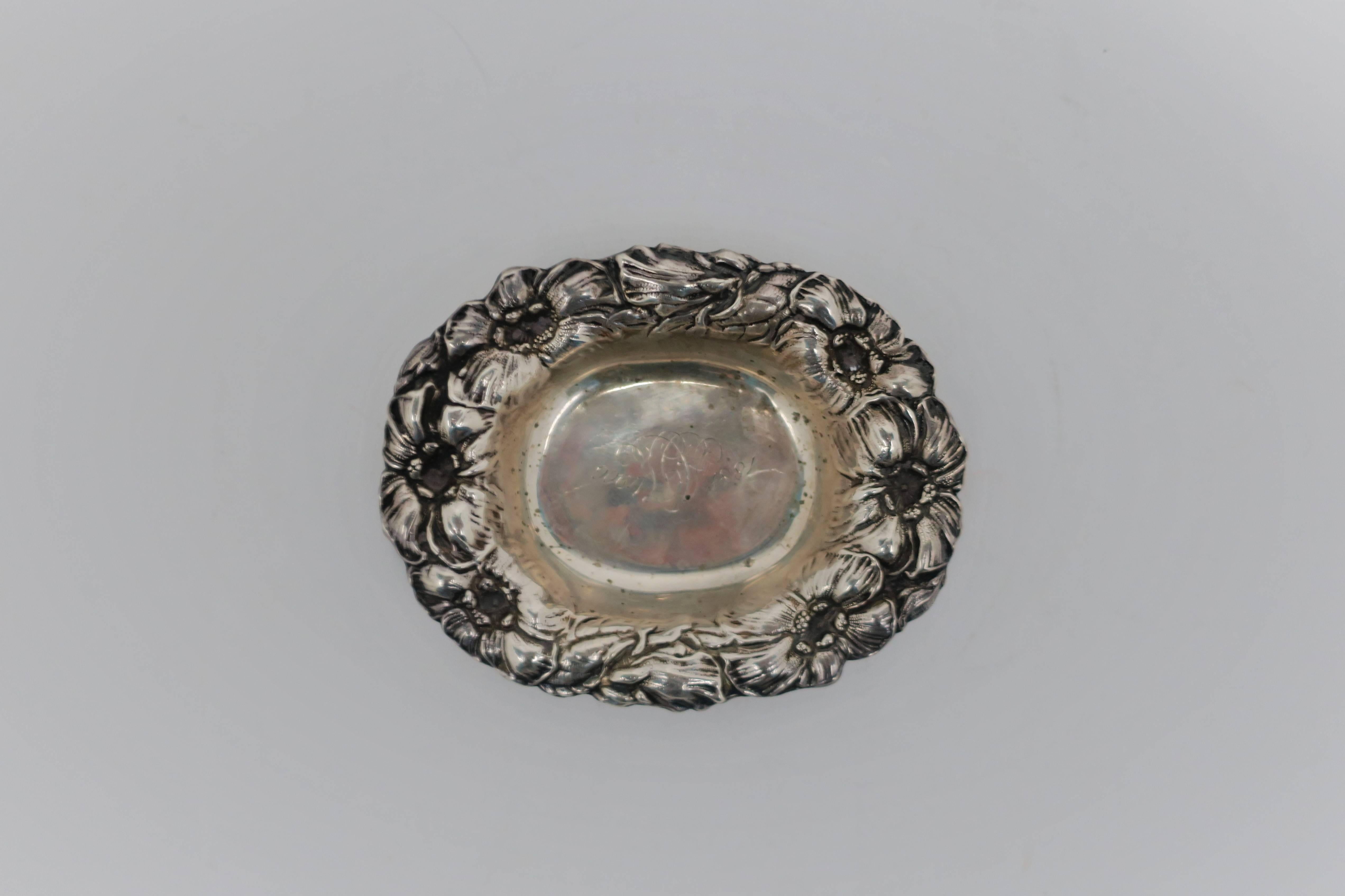 Antique sterling silver jewelry dish; a beautiful late 19th century sterling silver small oval jewelry dish with debossed or repoussé floral design. Piece is engraved: 