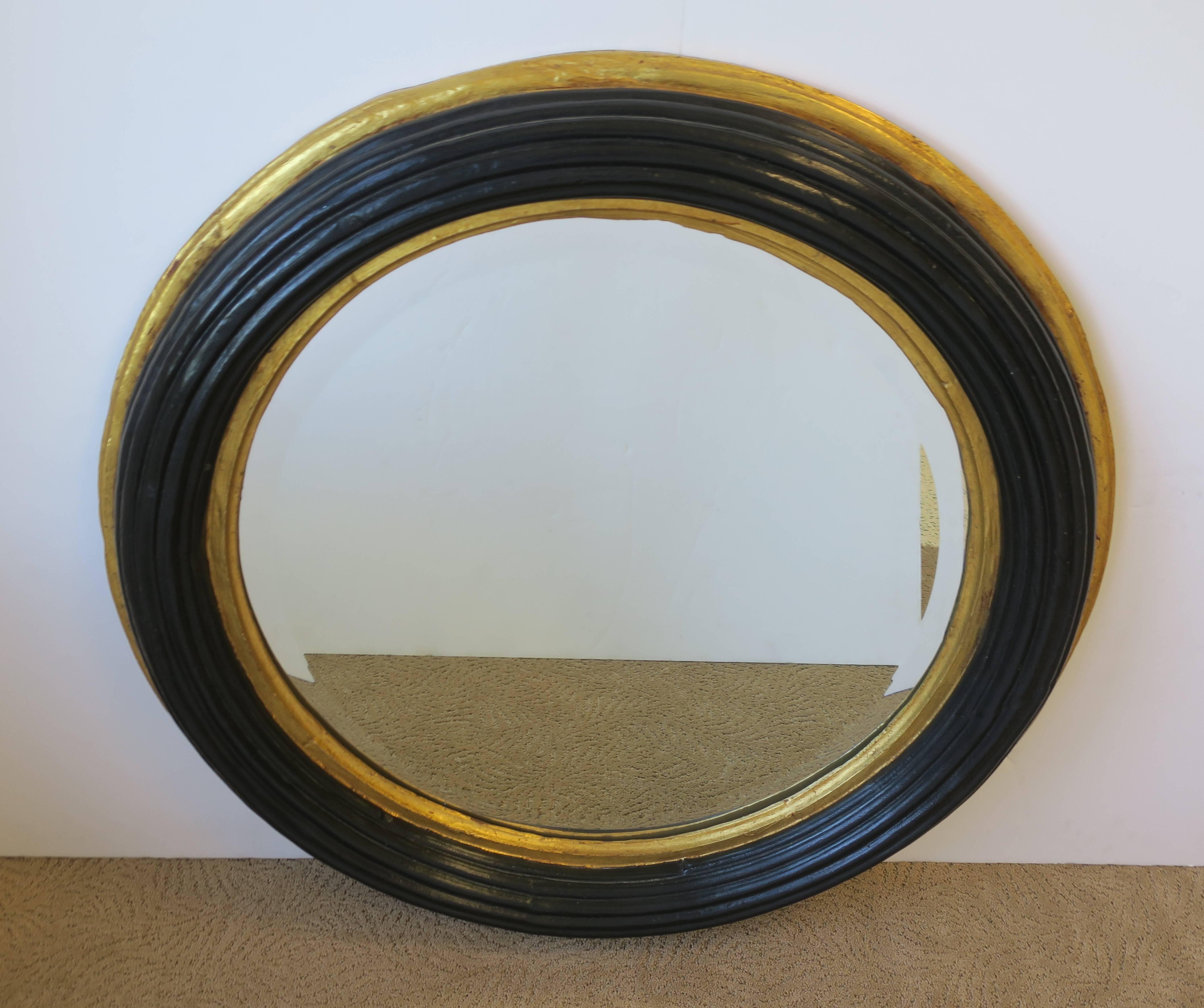 American Midcentury Round Black and Gold Beveled Wall Mirror