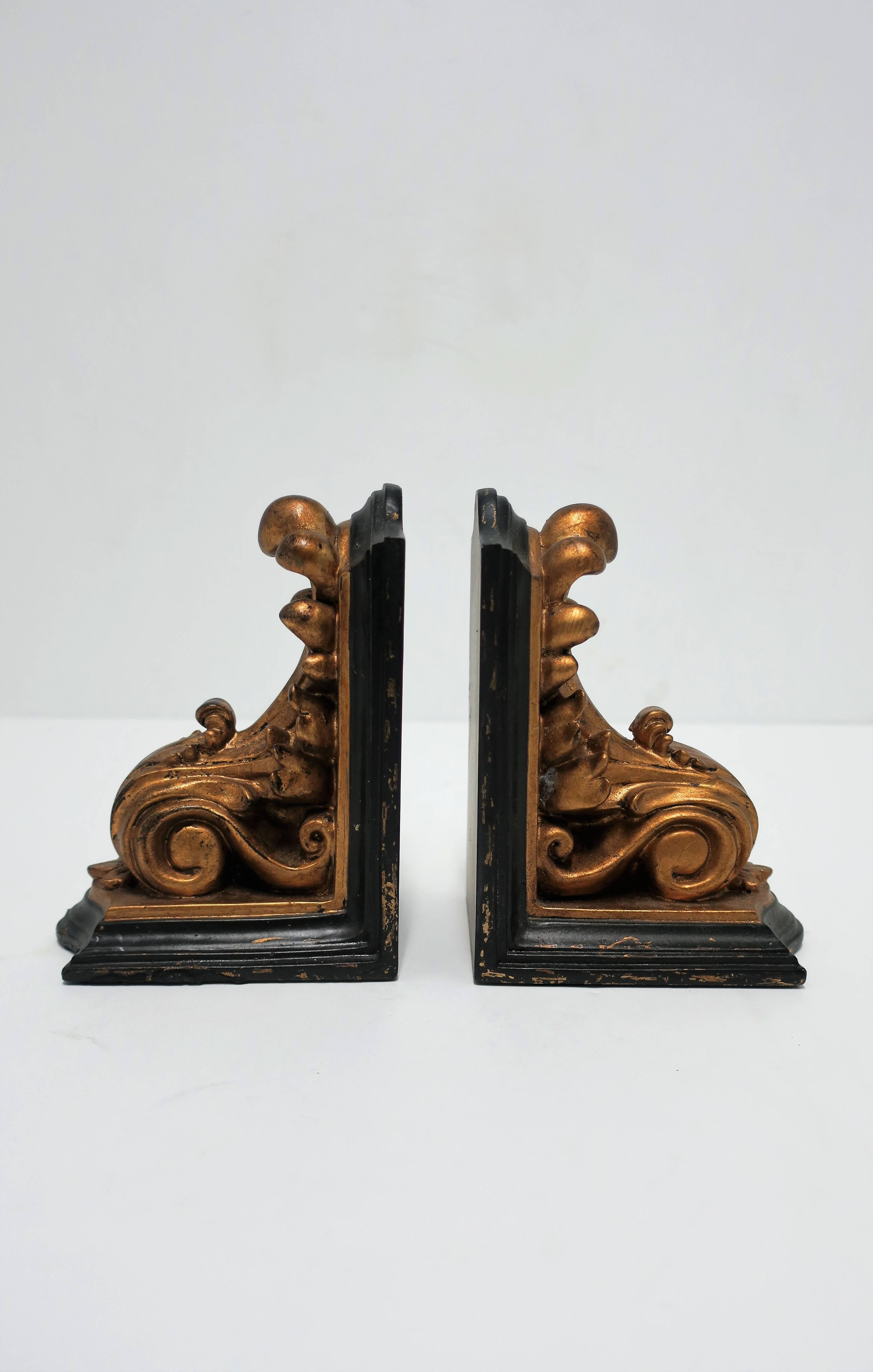 A beautiful pair of vintage black and gold Rococo style bookends. 

Each measure: 4.75 in. D x 3.5 in. W x 6.25 in. H

Pair available here online. By request, pair can be made available by appointment to the Trade in New York.