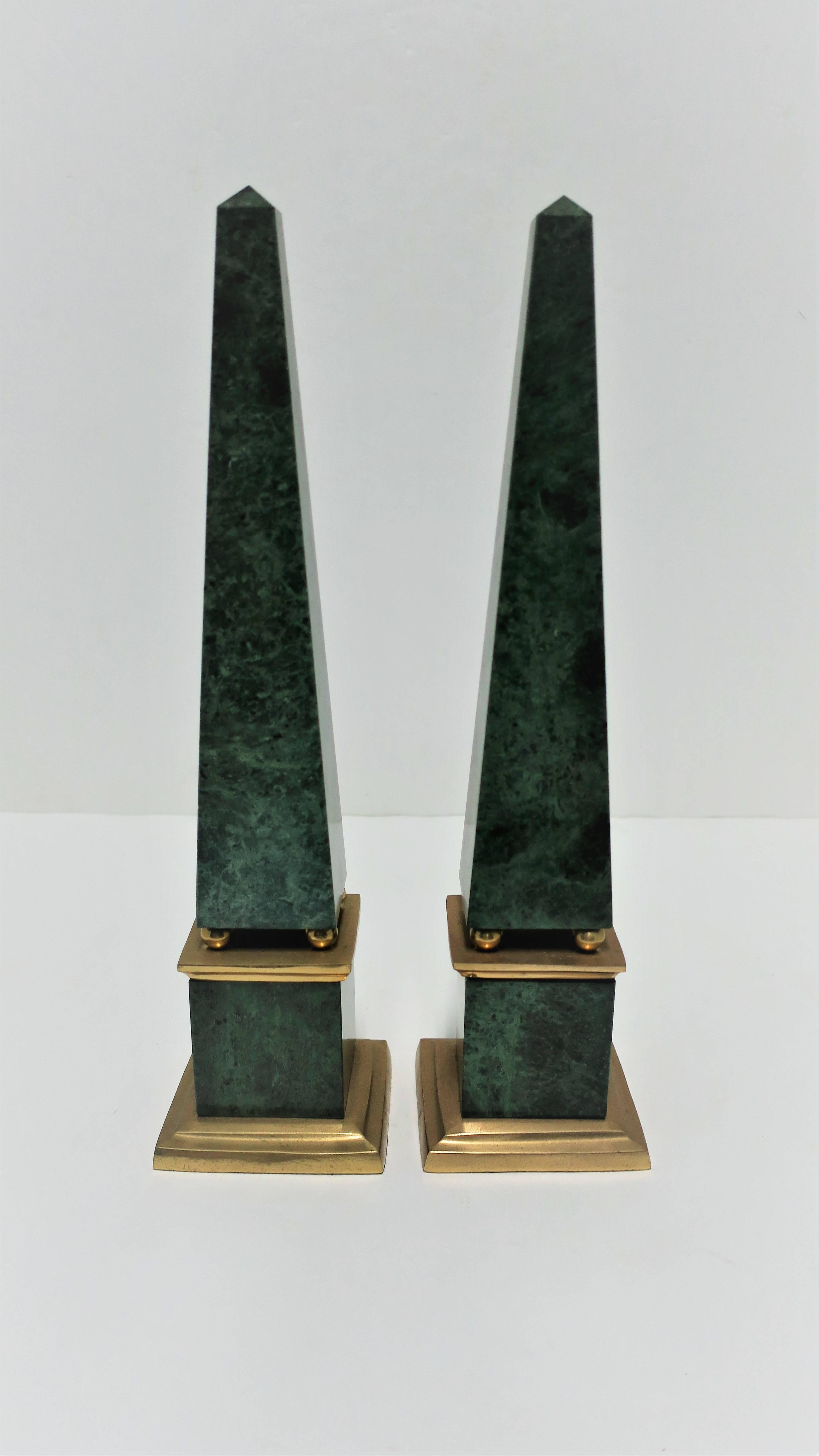 A substantial pair of vintage Modern green marble and bass obelisks, circa 1990s.

Each measure: 16 in. H x 3.75 in. square base

Pair available here online. By request, pair can be made available by appointment to the Trade in New York.