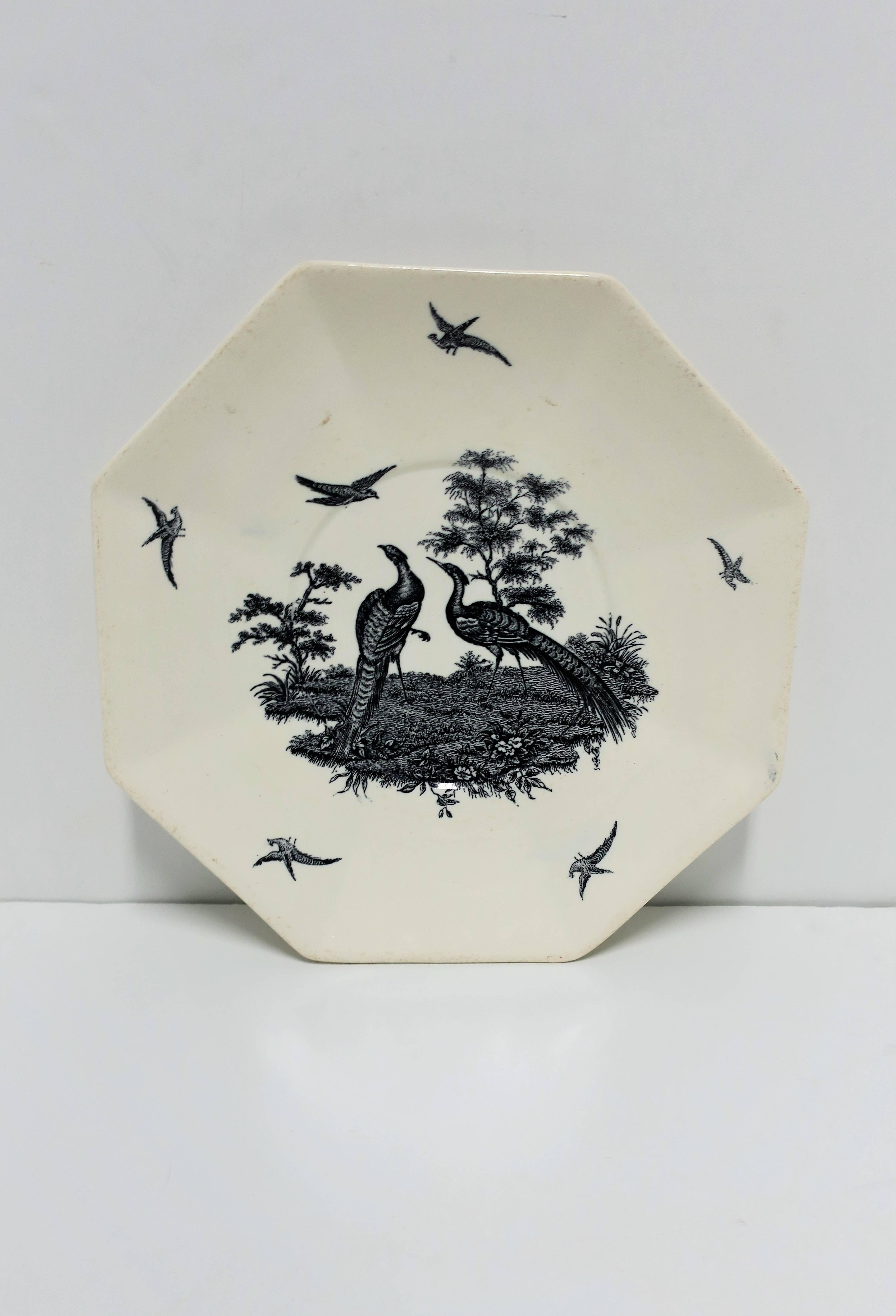A beautiful vintage octagonal English black and white Peacock birds decorated pate by Wedgwood, England. Modern octagonal shape to plate. Marker's mark on back, see images #6 and 7.

Measures: 9.75 in. diameter x 1 in. H

Wedgewood [SIC]
