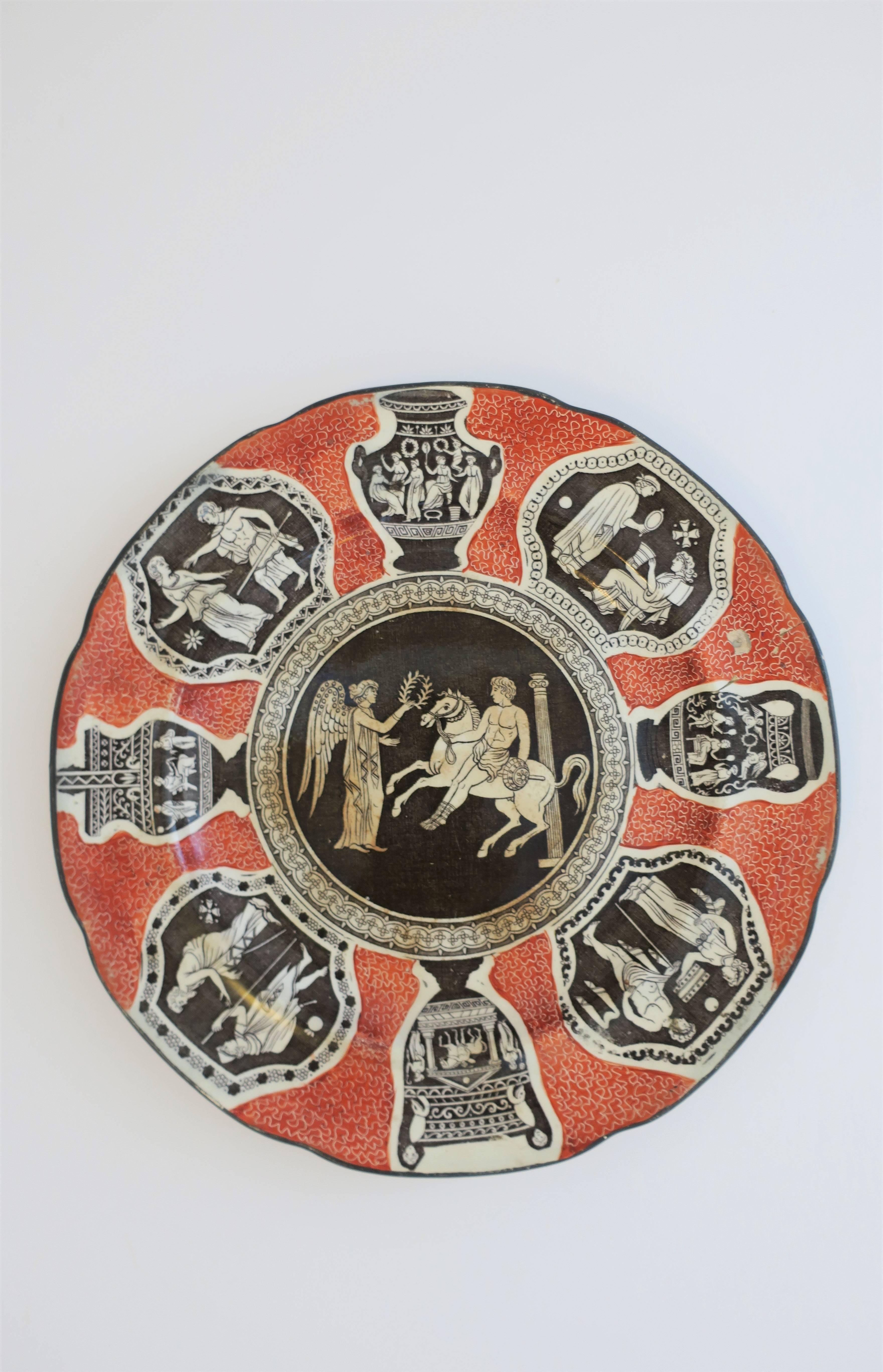 A beautiful antique figural relief wall art plate, circa 18th - 19th Century. Plate depicts urn, column, horse, and classic Greek figures. Colors include off-white or bisque ceramic porcelain with dark brown and orange. Marker's mark on back: