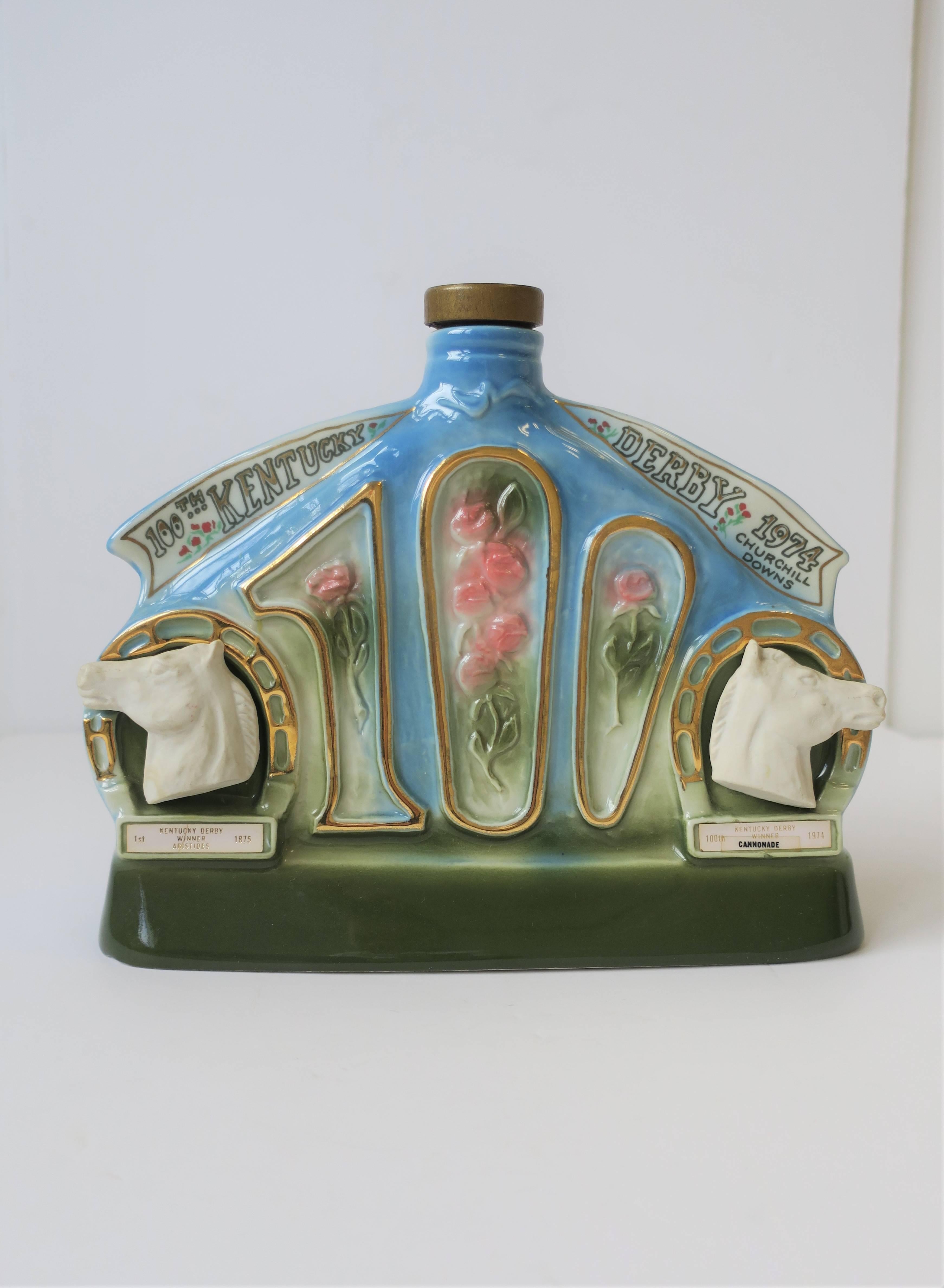 A vintage 100th Anniversary Kentucky Derby 'Run for the Roses' decanter liquor or spirits bottle by James B. Beam Distilling Co., circa 1974. Bottle commemorates the 100th Anniversary of the Kentucky Derby 'Run for the Roses' horse race with all