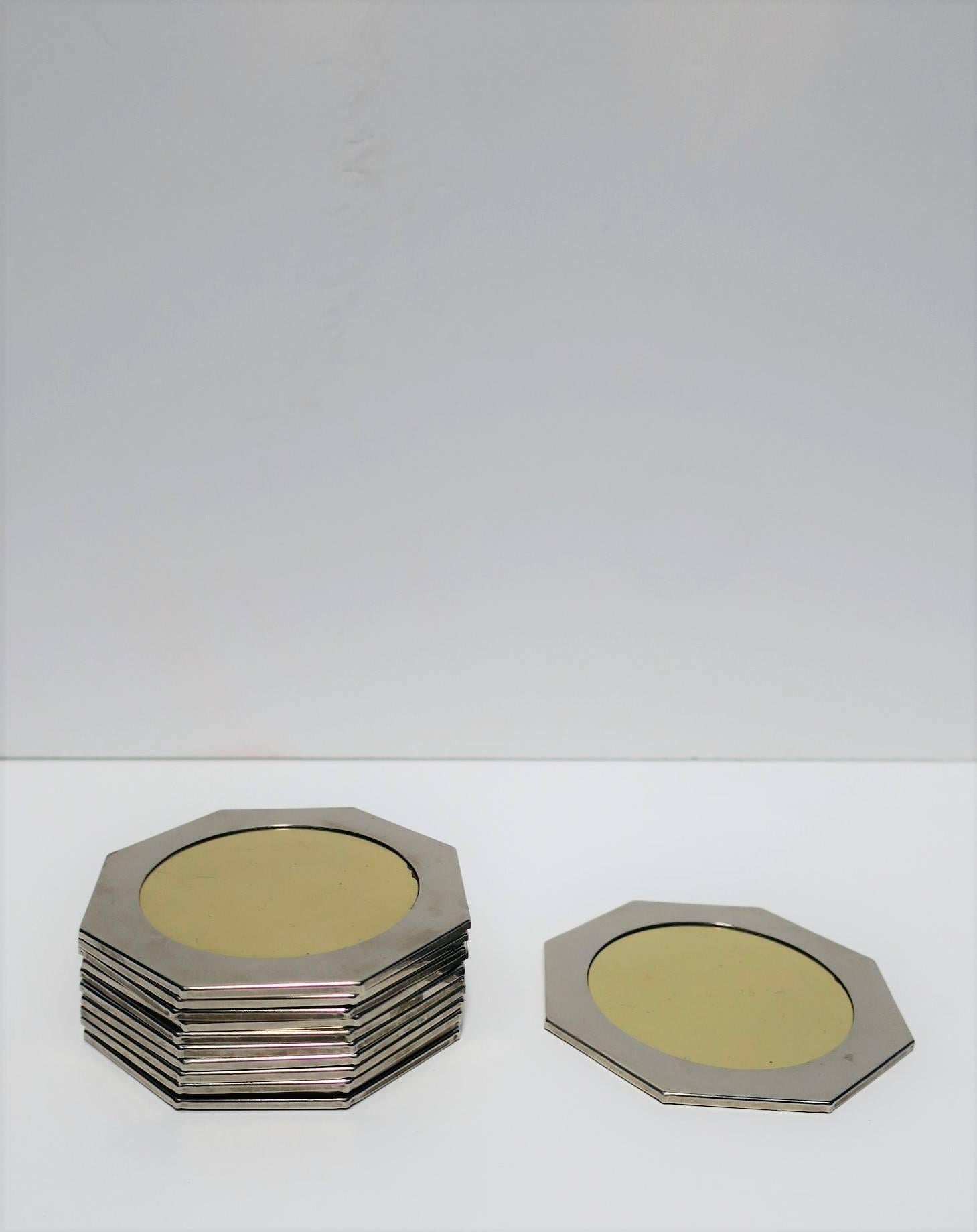 A chic set of six vintage modern brass and chrome octagonal coasters, circa 1970s Modern. Just one set of 6 available now. 


 