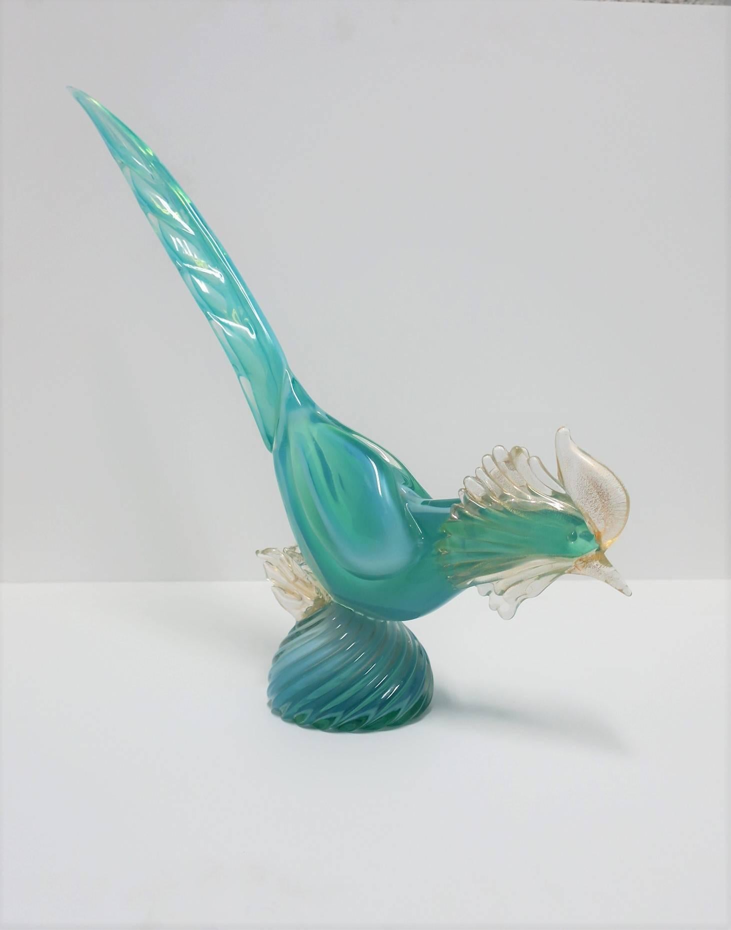 A beautiful, substantial, and relatively large modern Italian azure blue and gold Murano art glass rooster bird sculpture in the style of Archimede Seguso, circa mid-20th century, Italy. 

Bird measures: 4.75 in. diameter base x 19 in. W x 18 in.