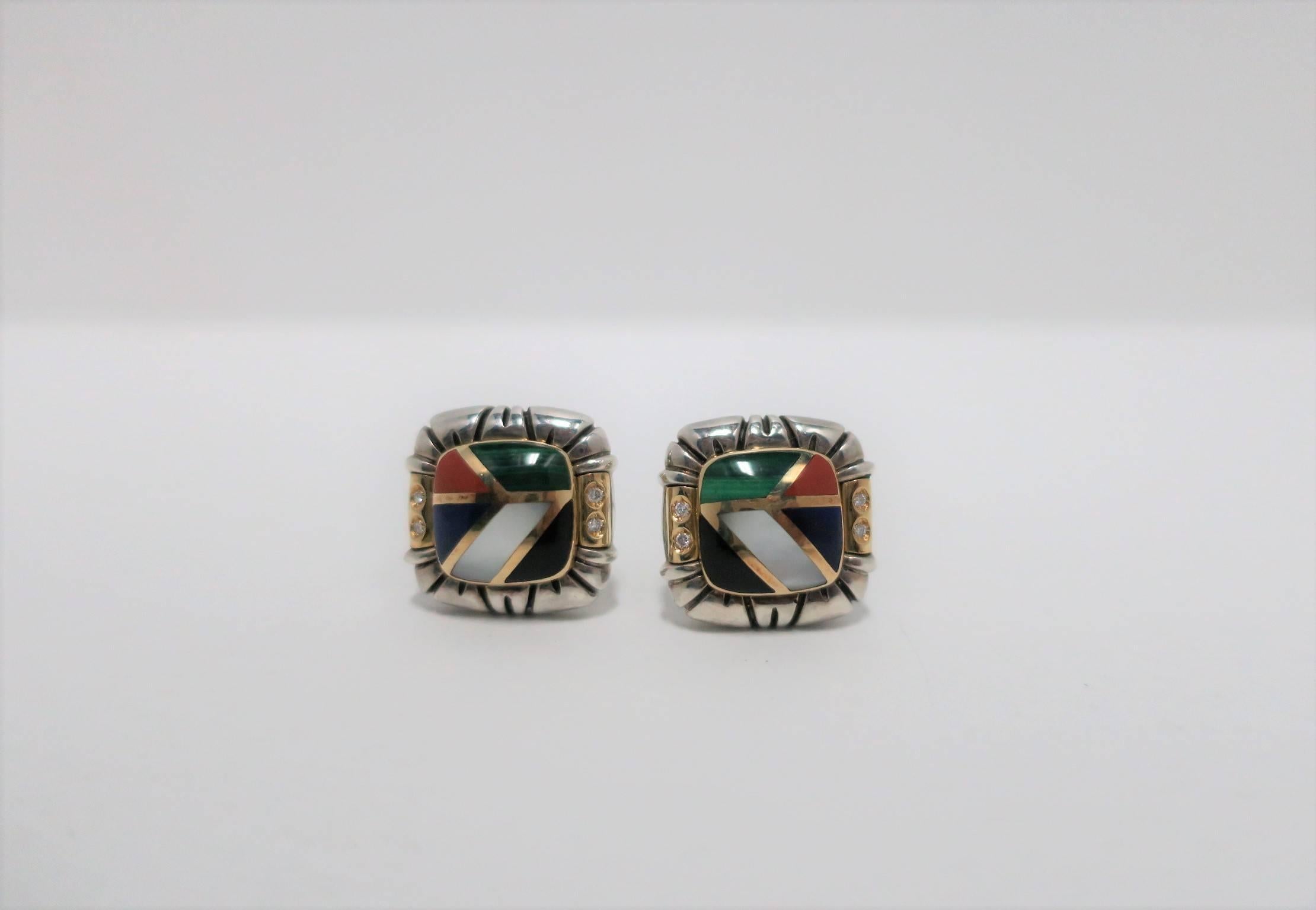 A beautiful pair of vintage designer earrings by Asch Grossbardt, circa 1990s. Earrings are inlaid and comprised of 18-karat gold, sterling silver, mother-of-pearl, black onyx, blue lapis, green malachite, red coral and diamonds (four diamonds in