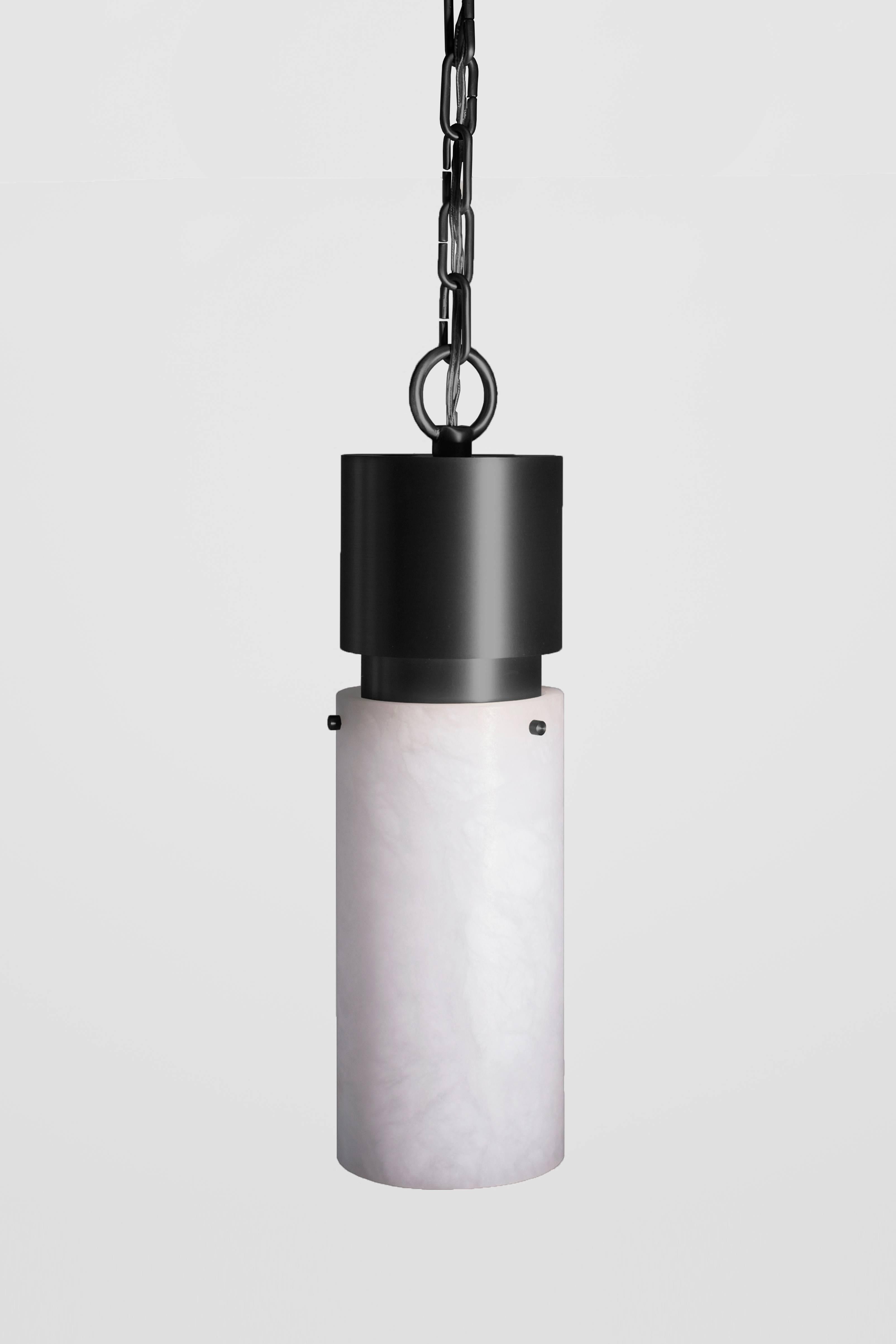 Orphan Work 000 Pendant
Shown in blackened brass and alabaster
Available in brushed brass, brushed nickel and blackened brass
Measures: 15 1/4” height x 5 3/8” diameter
Includes 3' of chain (rod available by request)
UL approved
Holds (1) 60w
