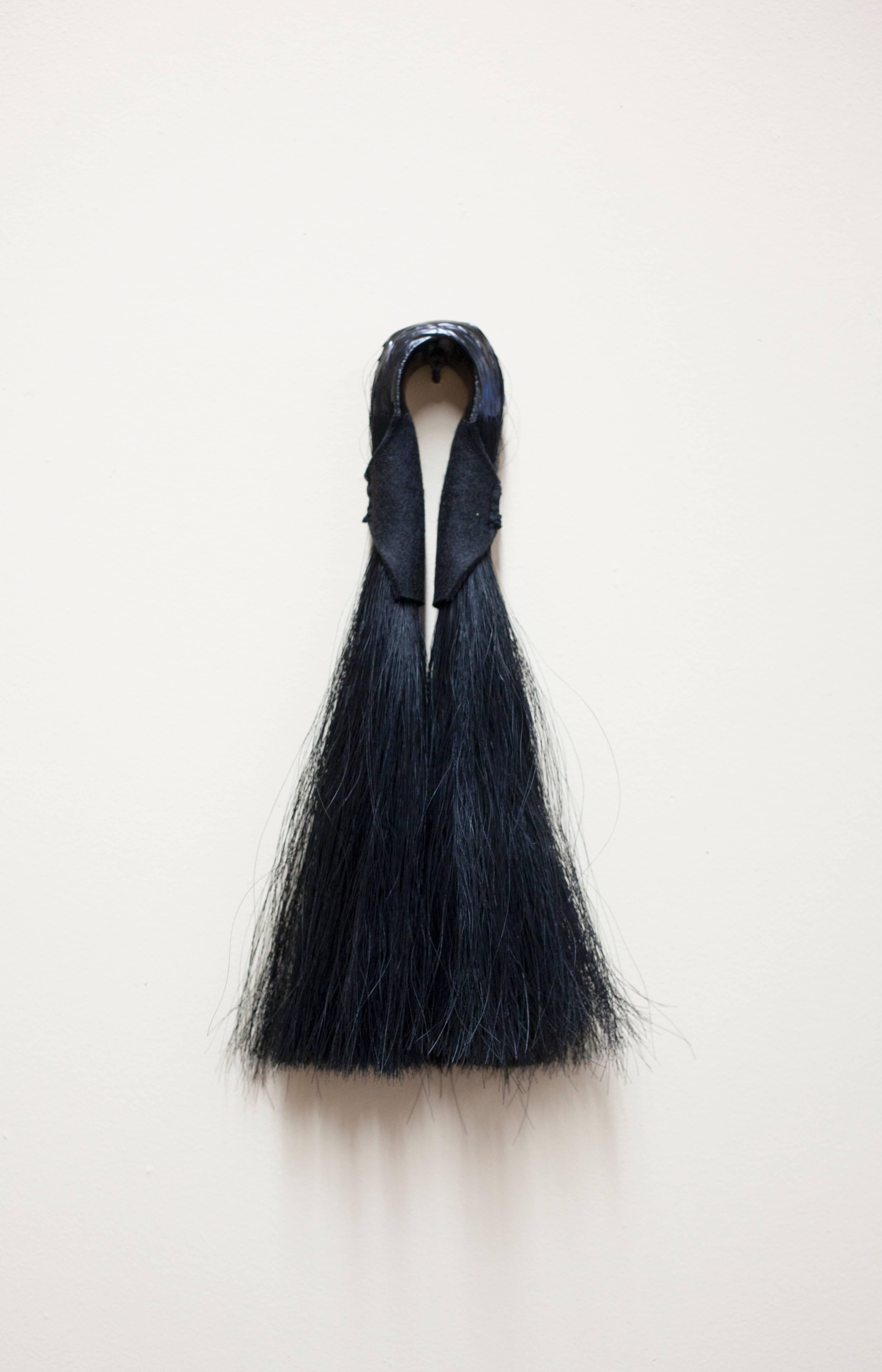Primal layered tassels woven by To Dødsfall in collaboration with material lust. A collection of materials, interconnected, woven into a series of strands determining fate. The history is held inside the threads and layers of threads, making Bo¨