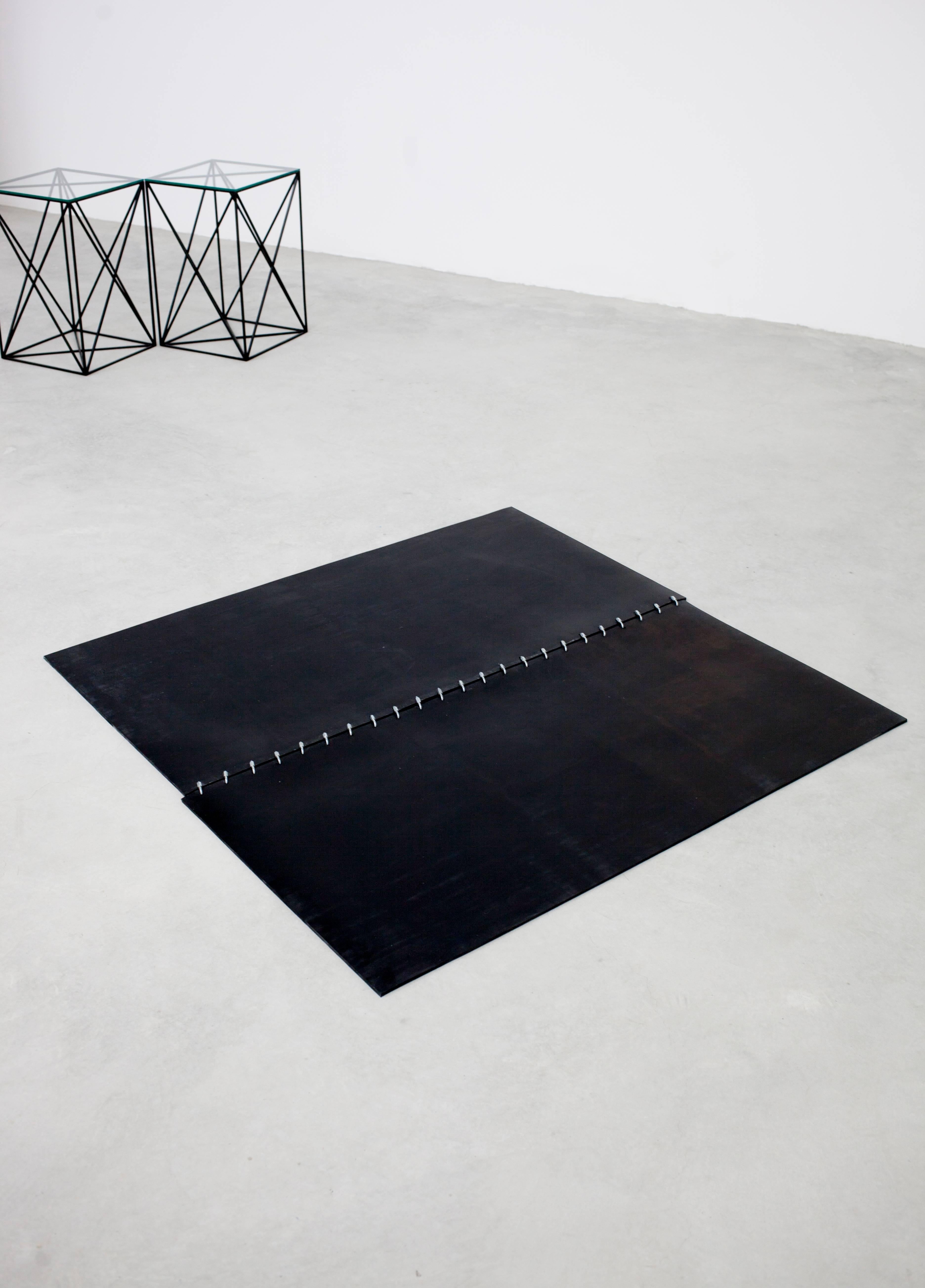 Okipa rug, 2017
Black rubber and stainless steel 
Measures: 4' W x 4' L 
(3' x 8' also shown $4,500 list) 
The piece can be used on the floor or wall. 

Made to order $190 SF. Lead time 2-4 weeks.
Each piece is handmade by Material Lust in