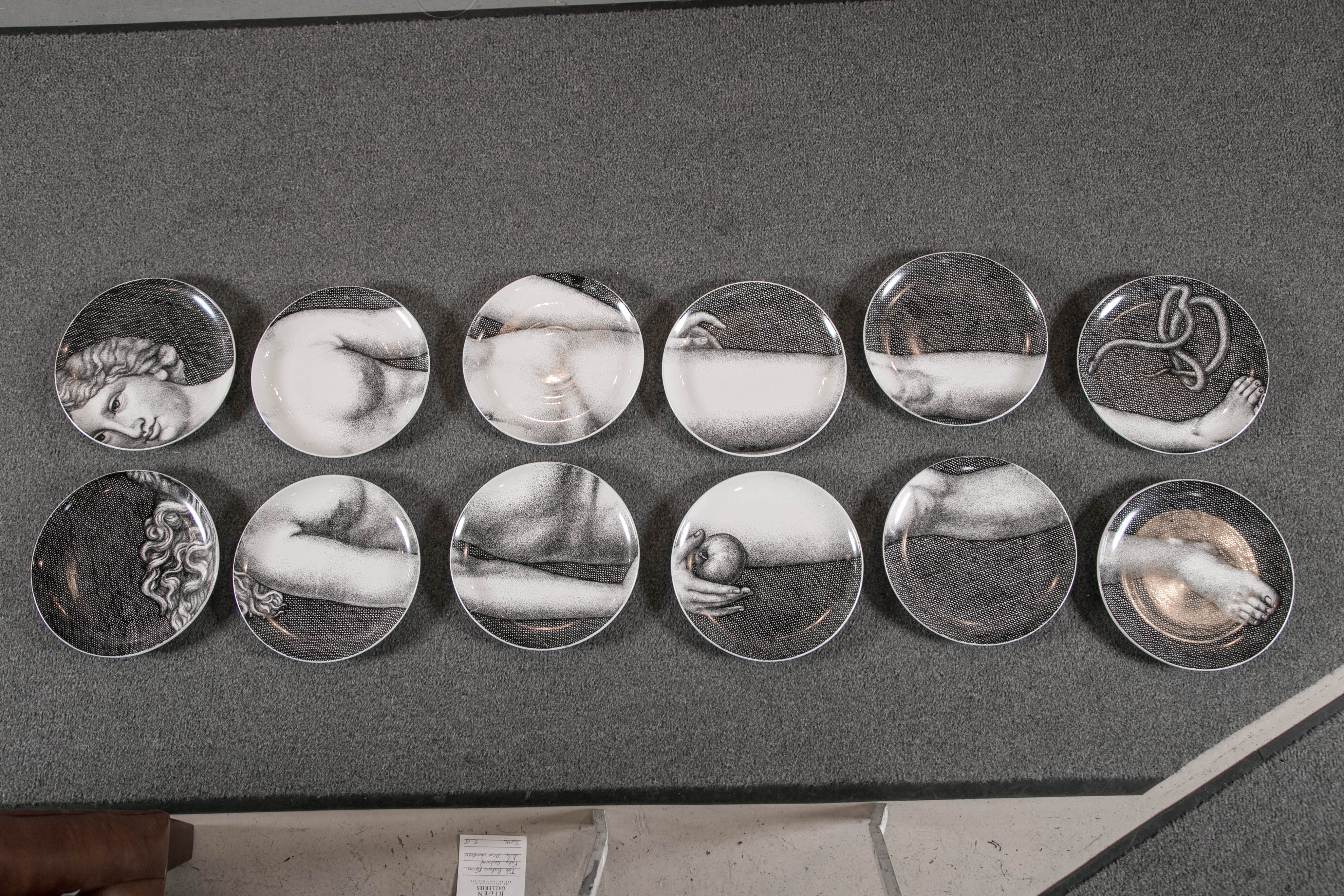 Set of Twelve Fornasetti Porcelain Plates Depicting Eve