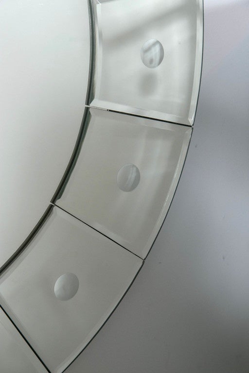 Both circular mirrors have a border pattern of small circles and measure 0.5