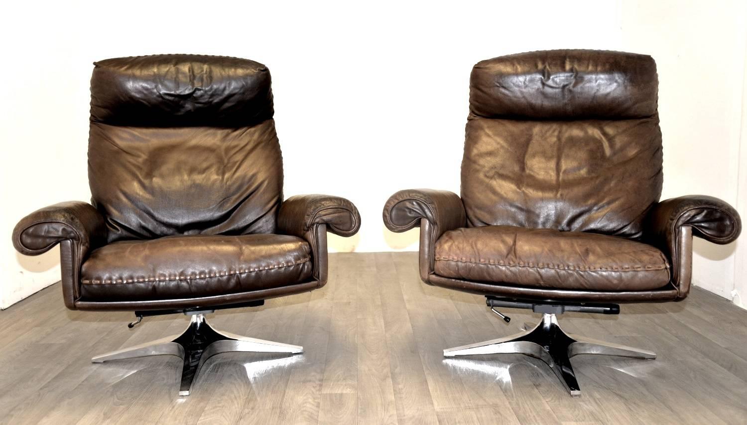 Discounted airfreight for our US and International customers ( from 2 weeks door to door )

We are delighted to bring to you a pair of vintage De Sede DS 31 highback swivel lounge club armchairs with matching ottoman. Hand built in the early 1970s